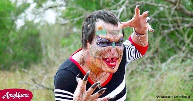 Woman spends thousands turning herself into a dragon – with horns and a forked tongue