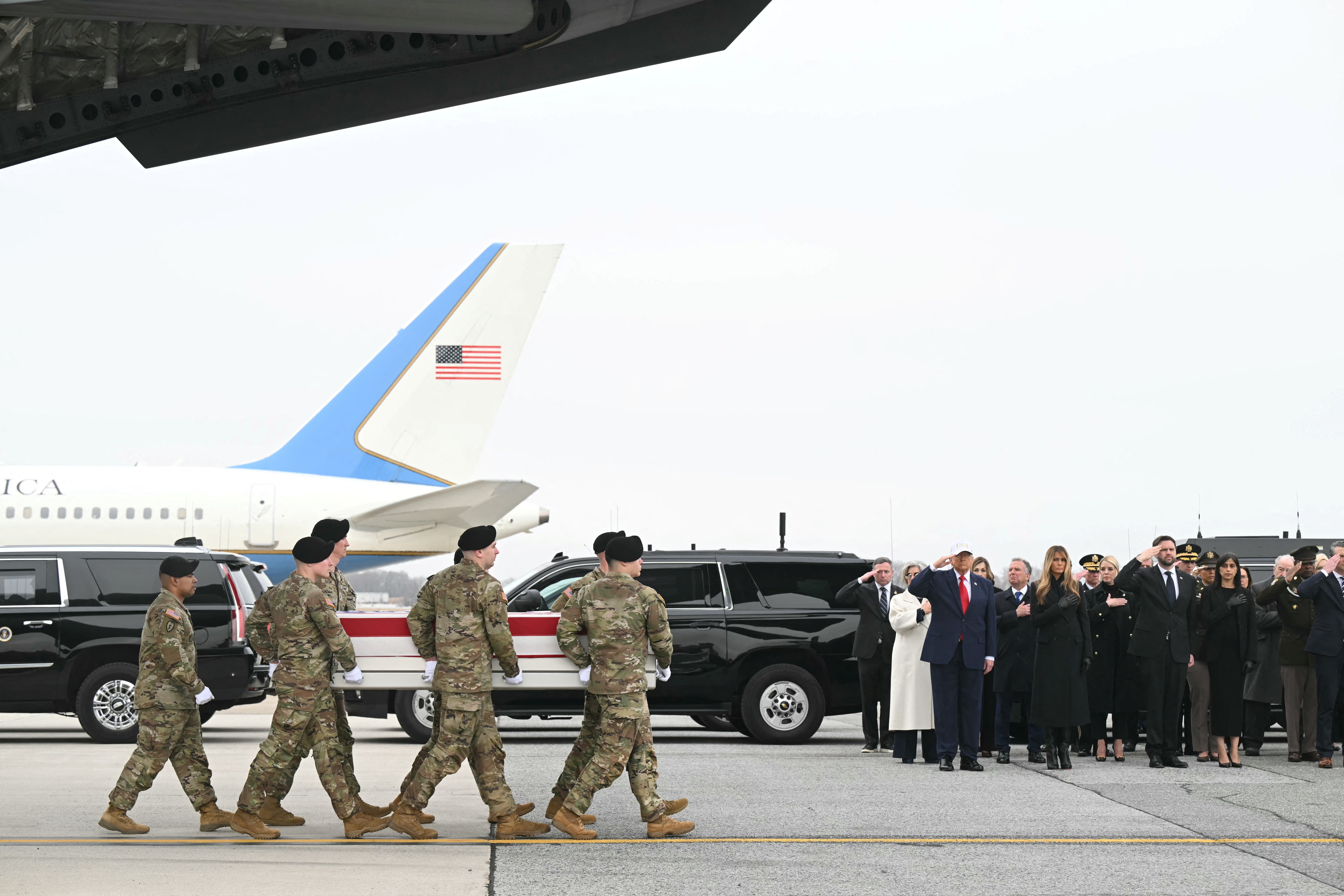U.S. Army team carry the flagged-drapped transfer case containing the remains of US soldier Sgt. 1st Class Nicole M. Amor during a dignified transfer solemn event at Dover Air Force Base, in Dover, Delaware, on March 7, 2026 | Source: Getty Images