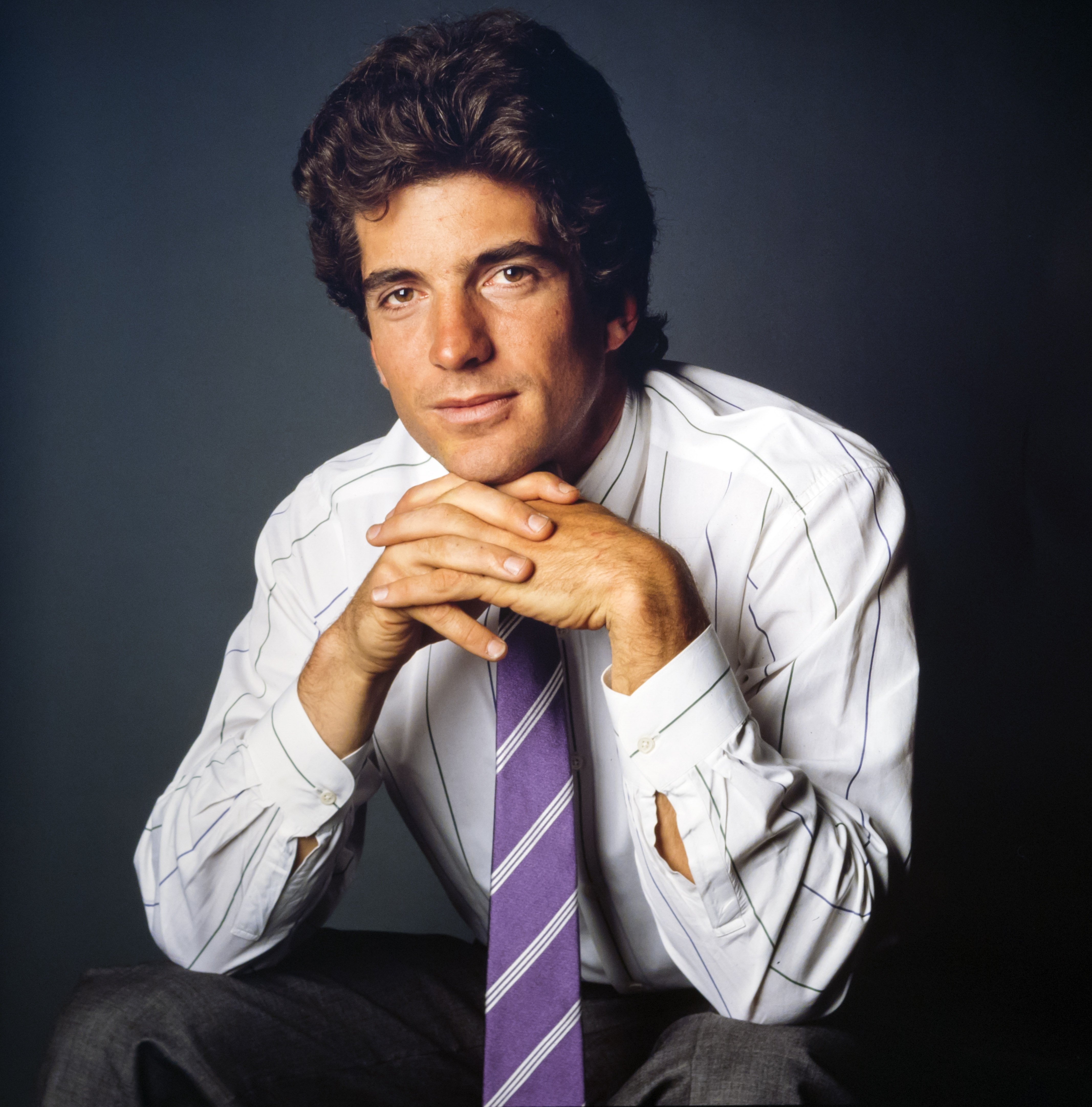 A studio portrait taken of John F Kennedy Jr in New York, 1988. | Source: Getty Images.