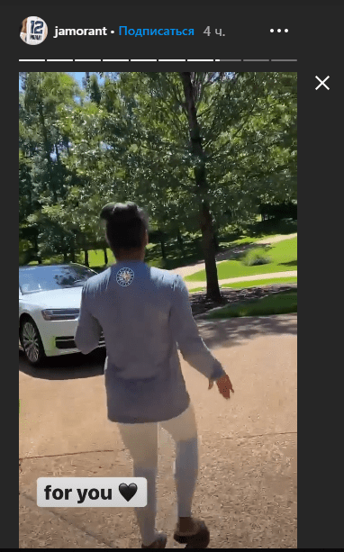 A photo of Ja Morant's mum walking towards her new car. | Photo: Instagram/Jamorant