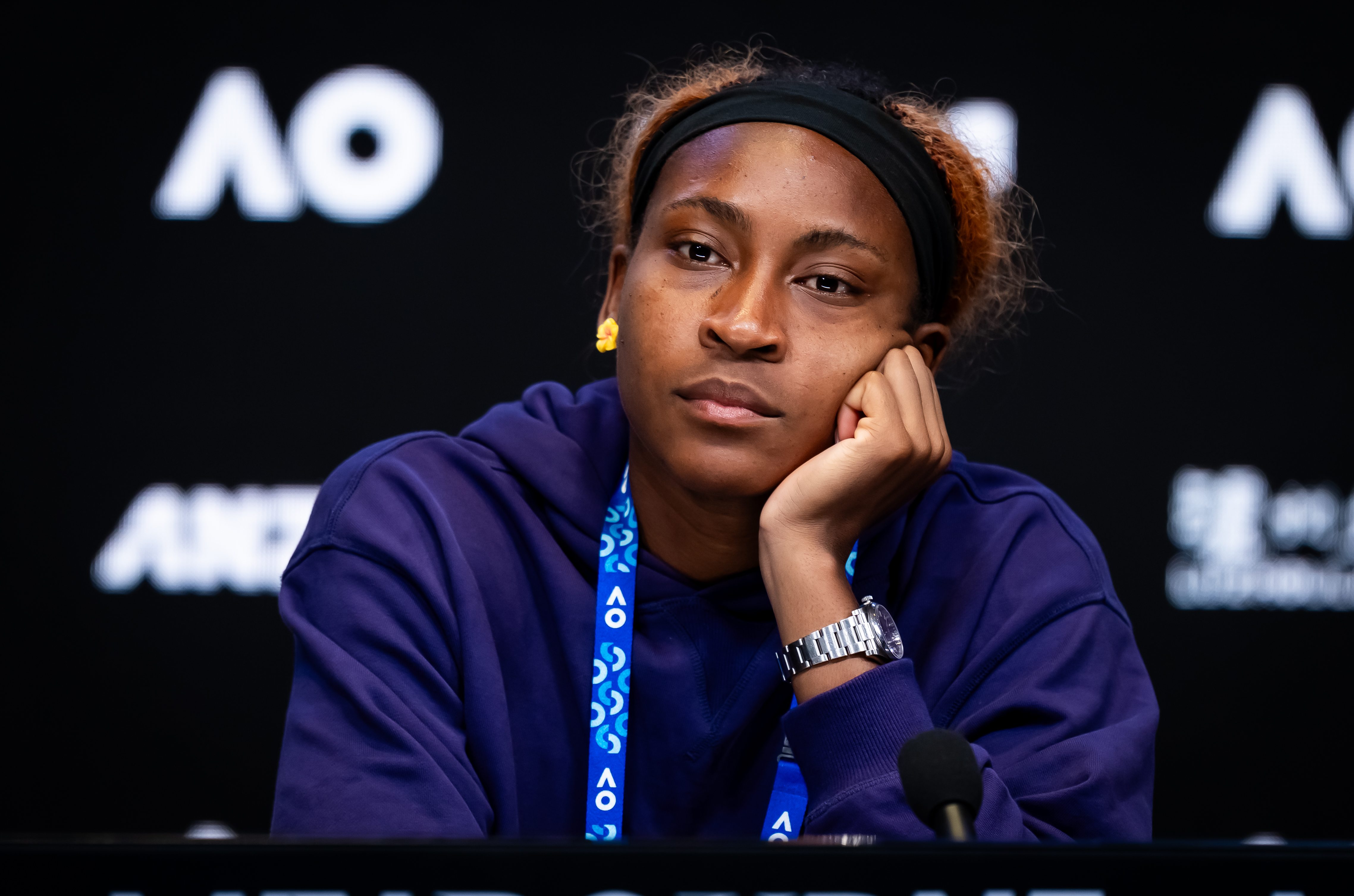 Coco Gauff talks to the media after losing to Elina Svitolina on January 27, 2026 | Source: Getty Images