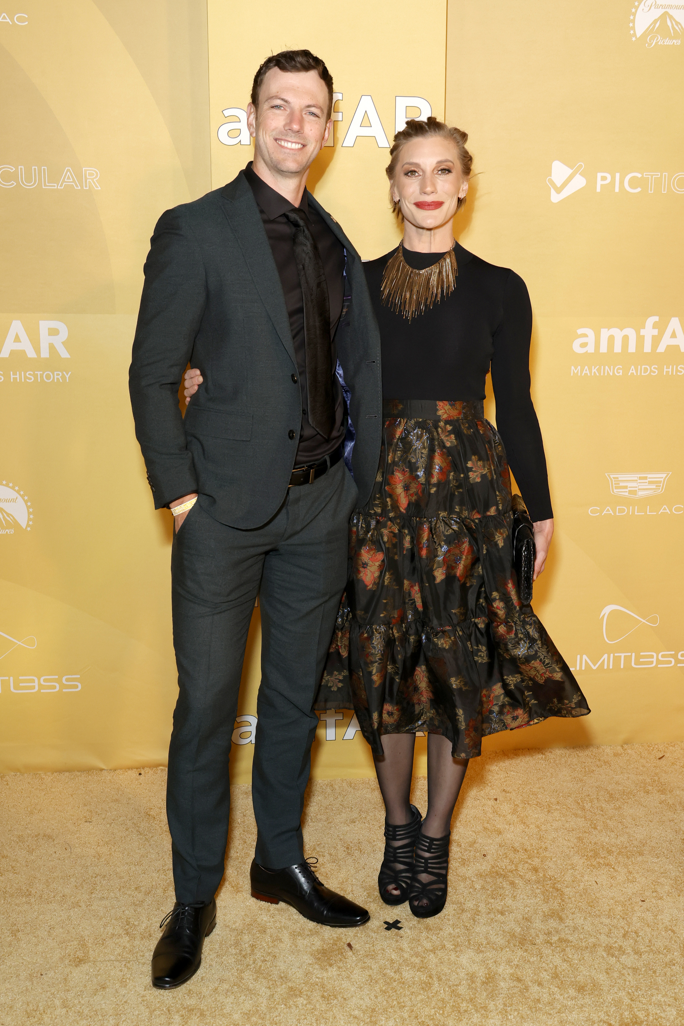Robin Gadsby and Katee Sackhoff are pictured at amfAR Gala Los Angeles 2022 at Pacific Design Center on November 3, 2022, in West Hollywood, California | Source: Getty Images