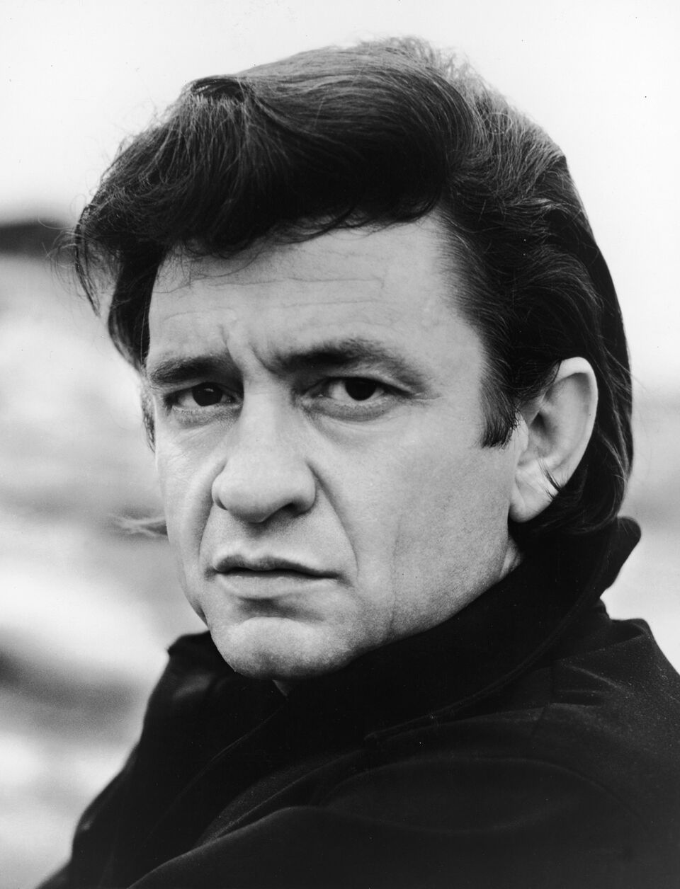 Headshot portrait of Johnny Cash for his television show. | Source: Getty Images
