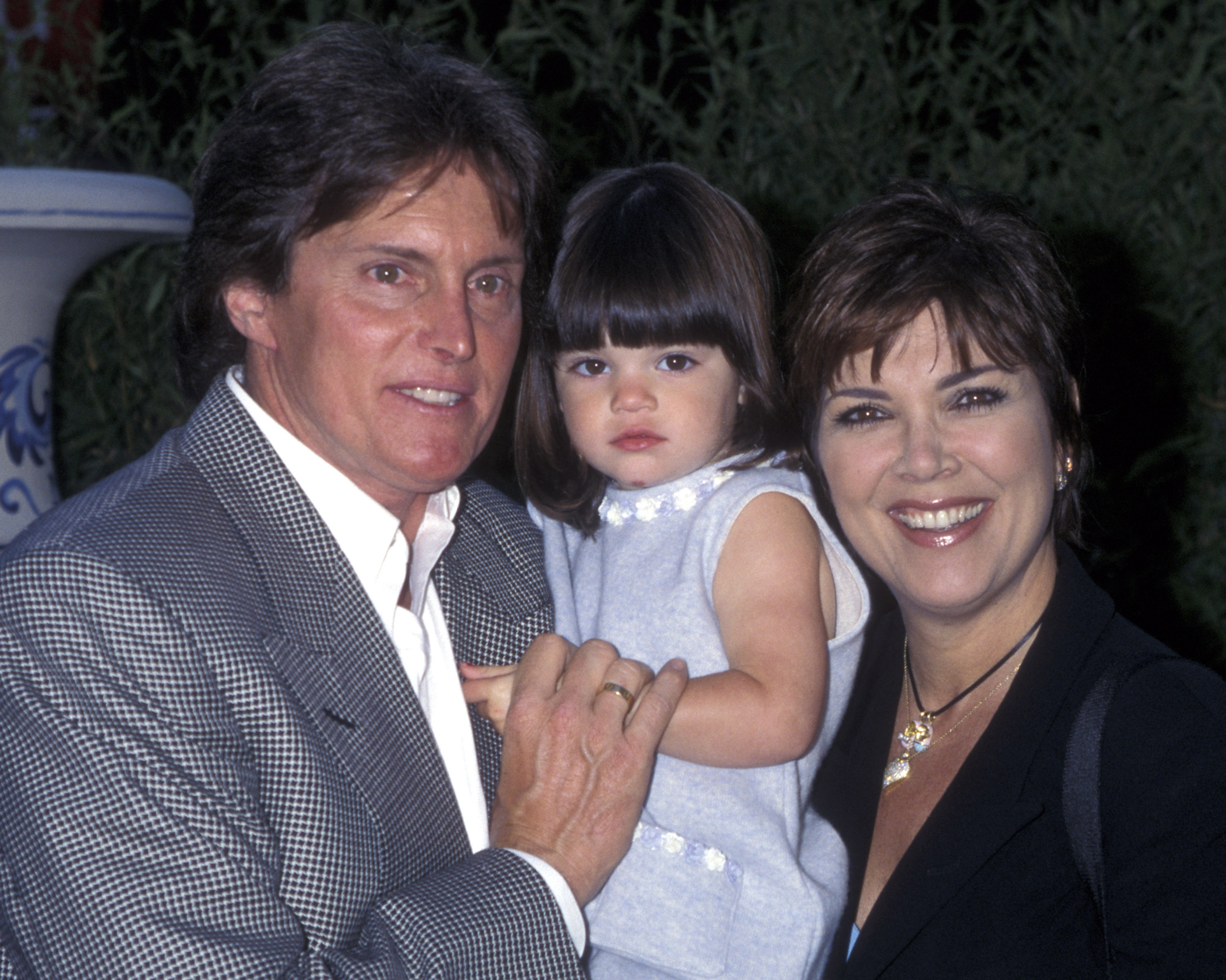 Bruce, Kendall, and Kris Jenner attend "Mulan" on June 5, 1988 | Source: Getty Images