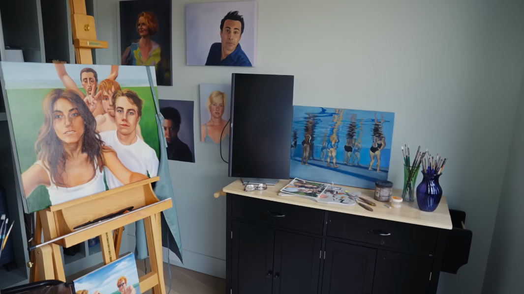 Sherman's studio is one of the least staged-looking rooms in the apartment — because it is very much a working space. Portraits, brushes and works in progress reveal the creative process behind the art seen elsewhere in the home. | Source: YouTube/Architectural Digest