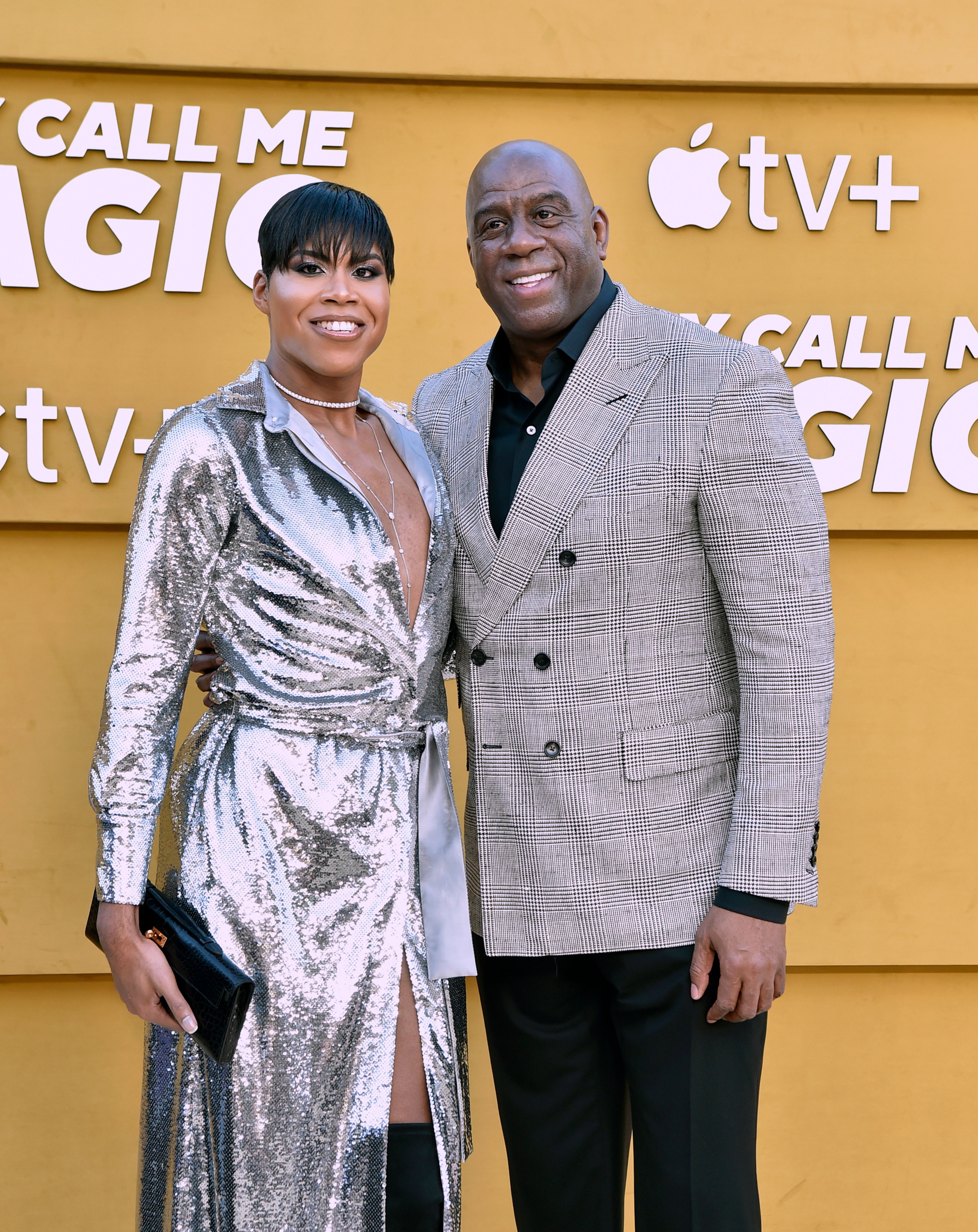 EJ Johnson and Magic Johnson attend the Los Angeles premiere of Apple's "They Call Me Magic" at Regency Village Theatre on April 14, 2022, in Los Angeles, California.