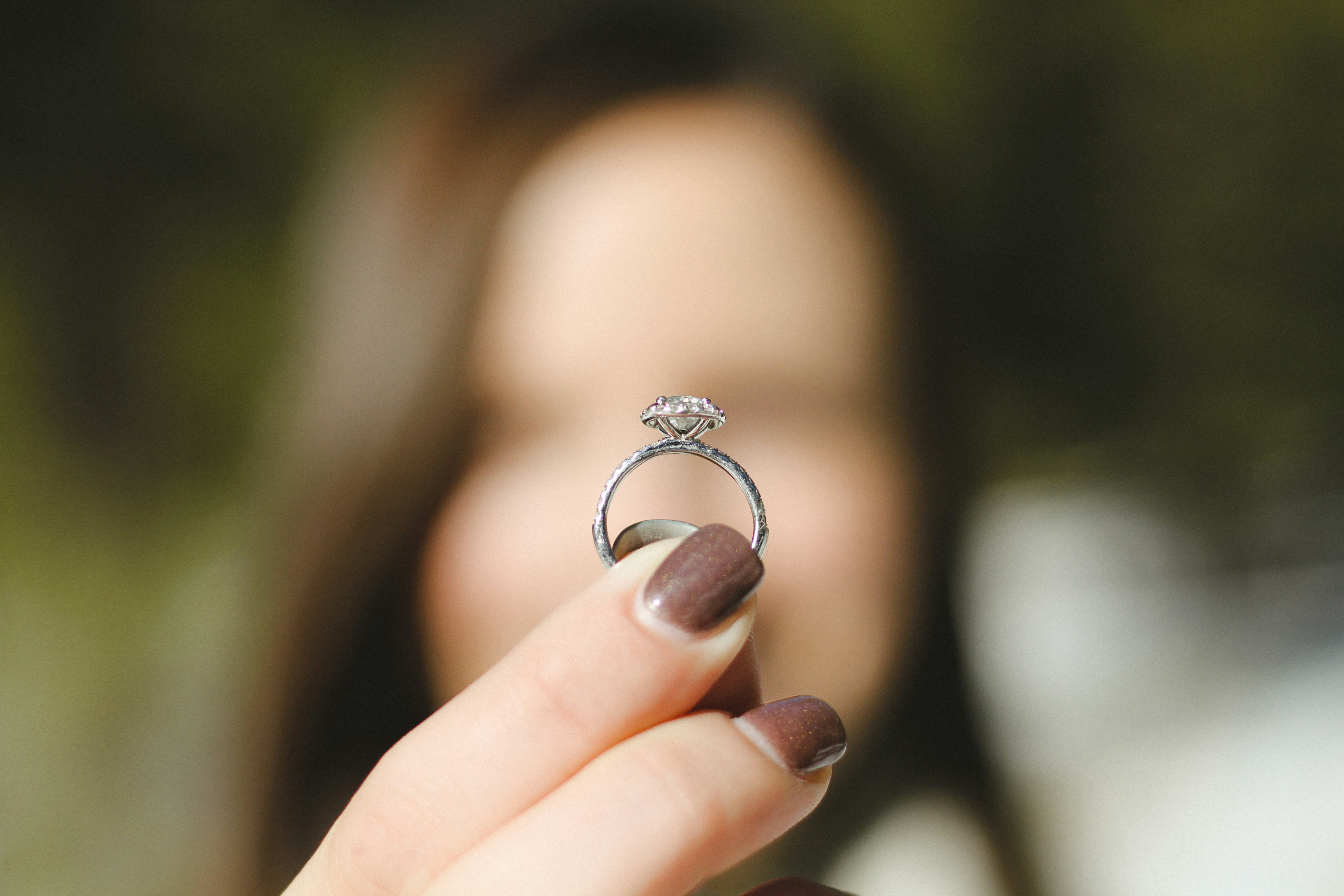 Woman admiring a diamond ring | Source: Unsplash