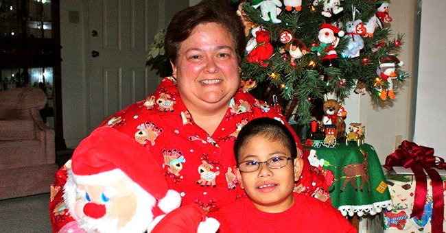 A woman and her son whom she adopted after his biological mom passed away | Photo: Facebook/tina.vesey