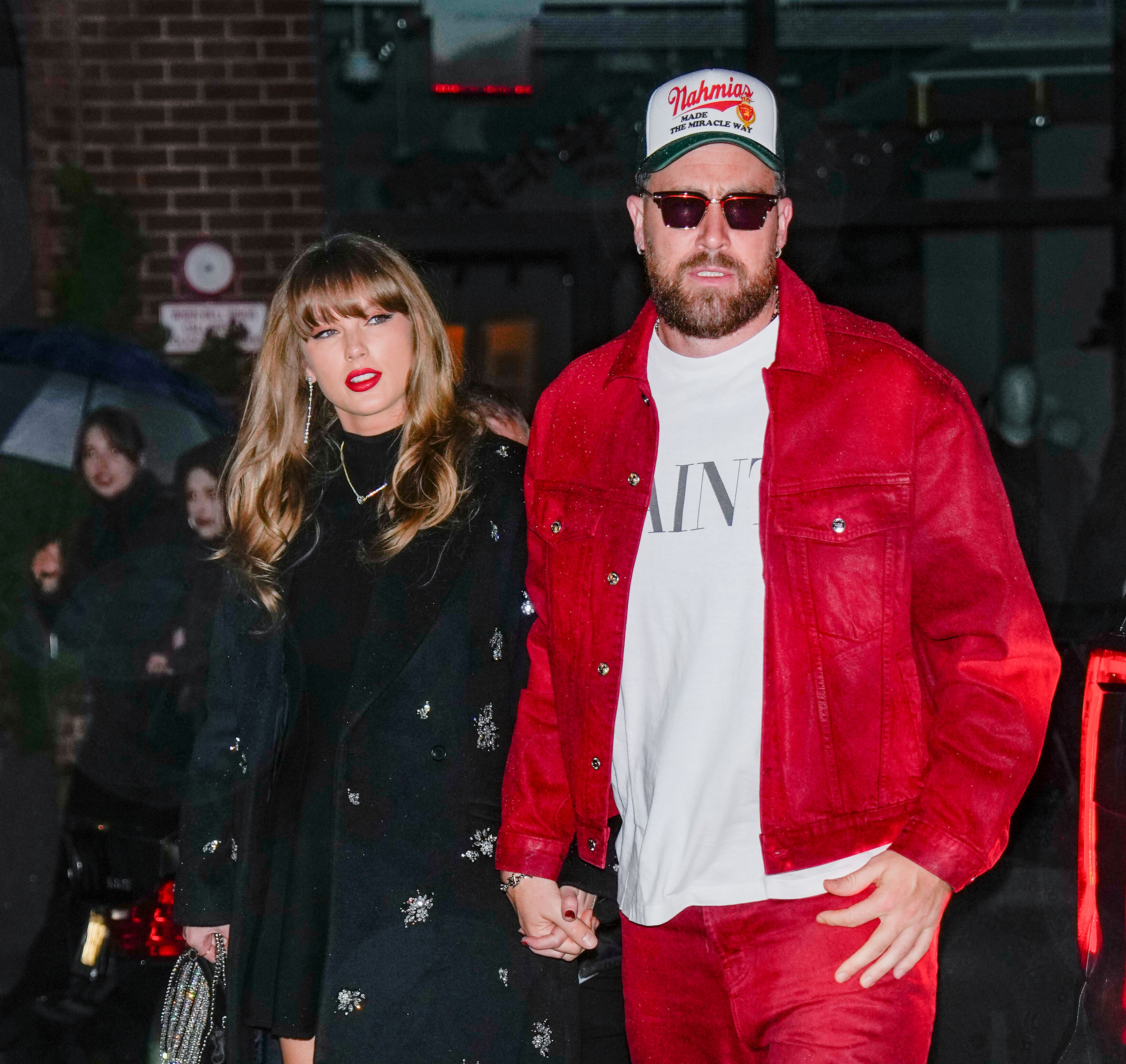 Taylor Swift and Travis Kelce are seen on December 28, 2024 in New York City. | Source: Getty Images