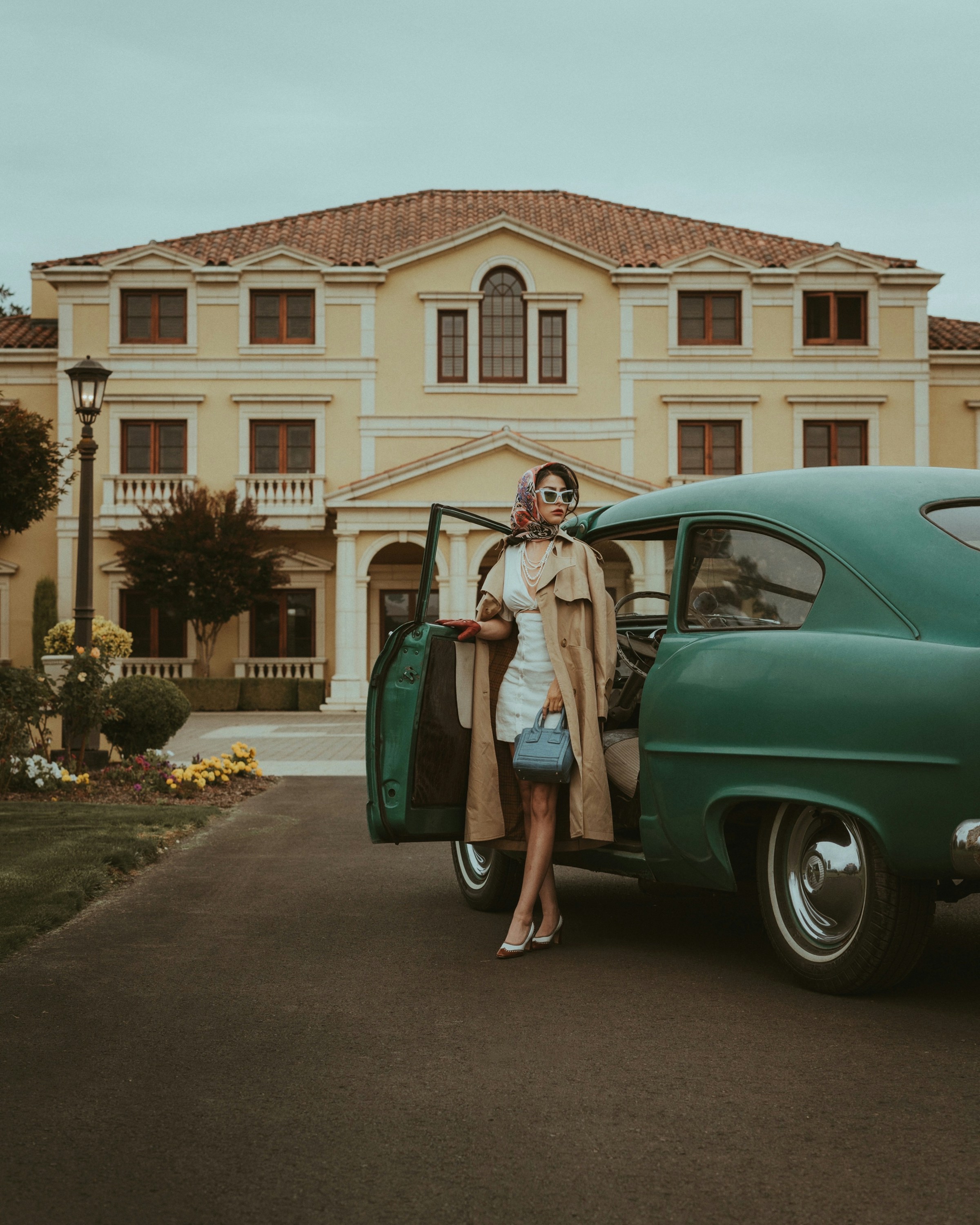 Rich woman getting out of a car | Source: Unsplash