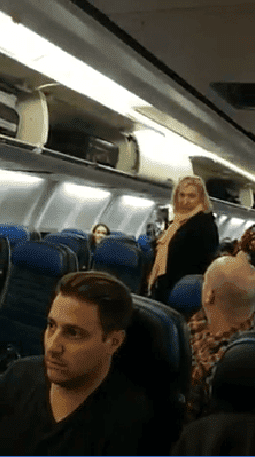 "Why don’t you try and sit between those two pigs?” the woman says to another passenger. | Source: Facebook/Smash Da Topic Breaking News