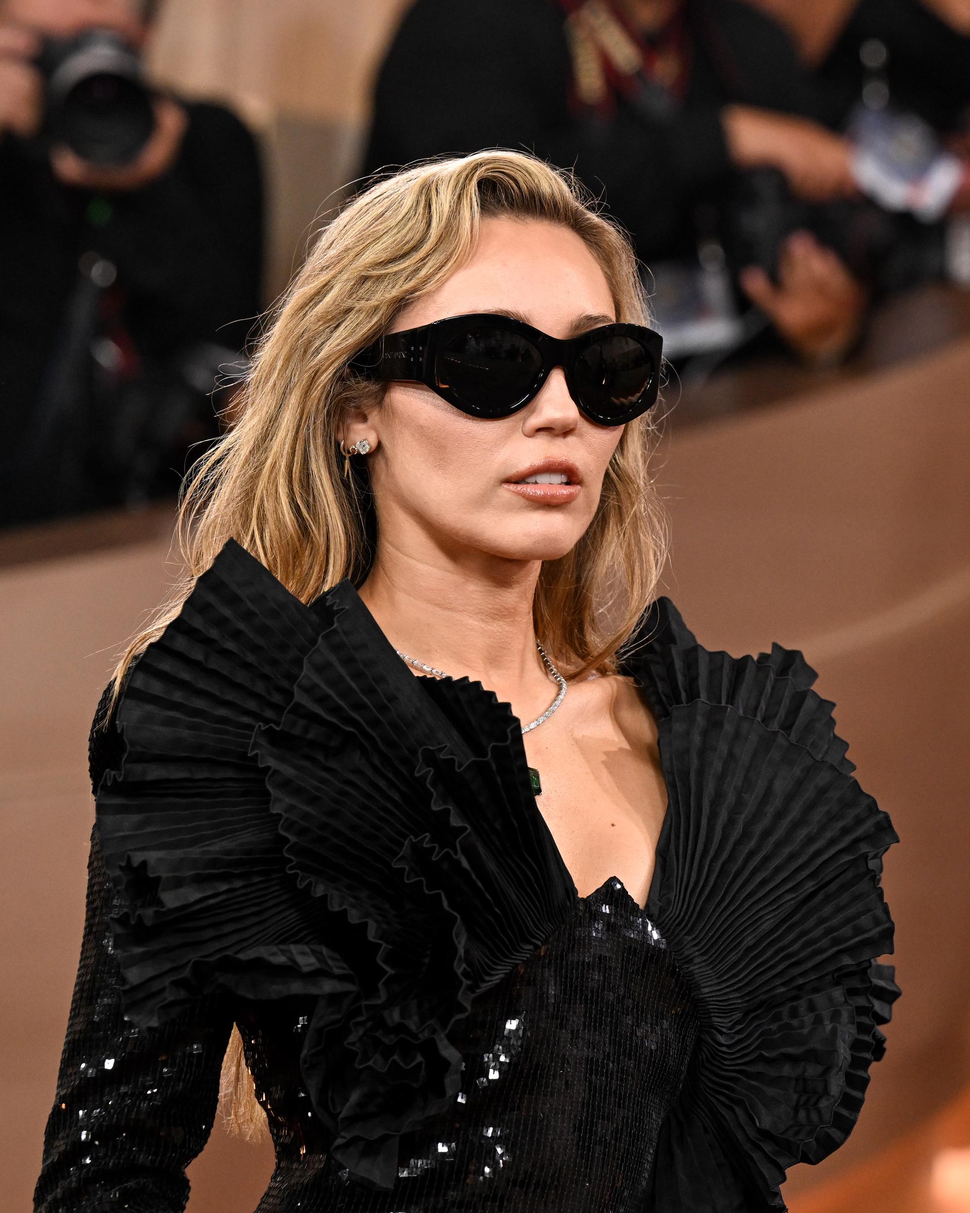 Miley Cyrus on the red carpet at the Golden Globes held at the Beverly Hilton on January 11, 2026, in Beverly Hills, California | Source: Getty Images