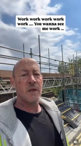In a post dated 21 April 2026, John Hendy films himself mid-shift on a rooftop, wearing a hi-vis jacket as scaffolding and building materials stretch out behind him. The candid clip captures his day-to-day reality, with the overlay text "Work work work work work .... You wanna see me work ..." reinforcing his hands-on routine. | Source: Instagram/johnhendyeast17_official