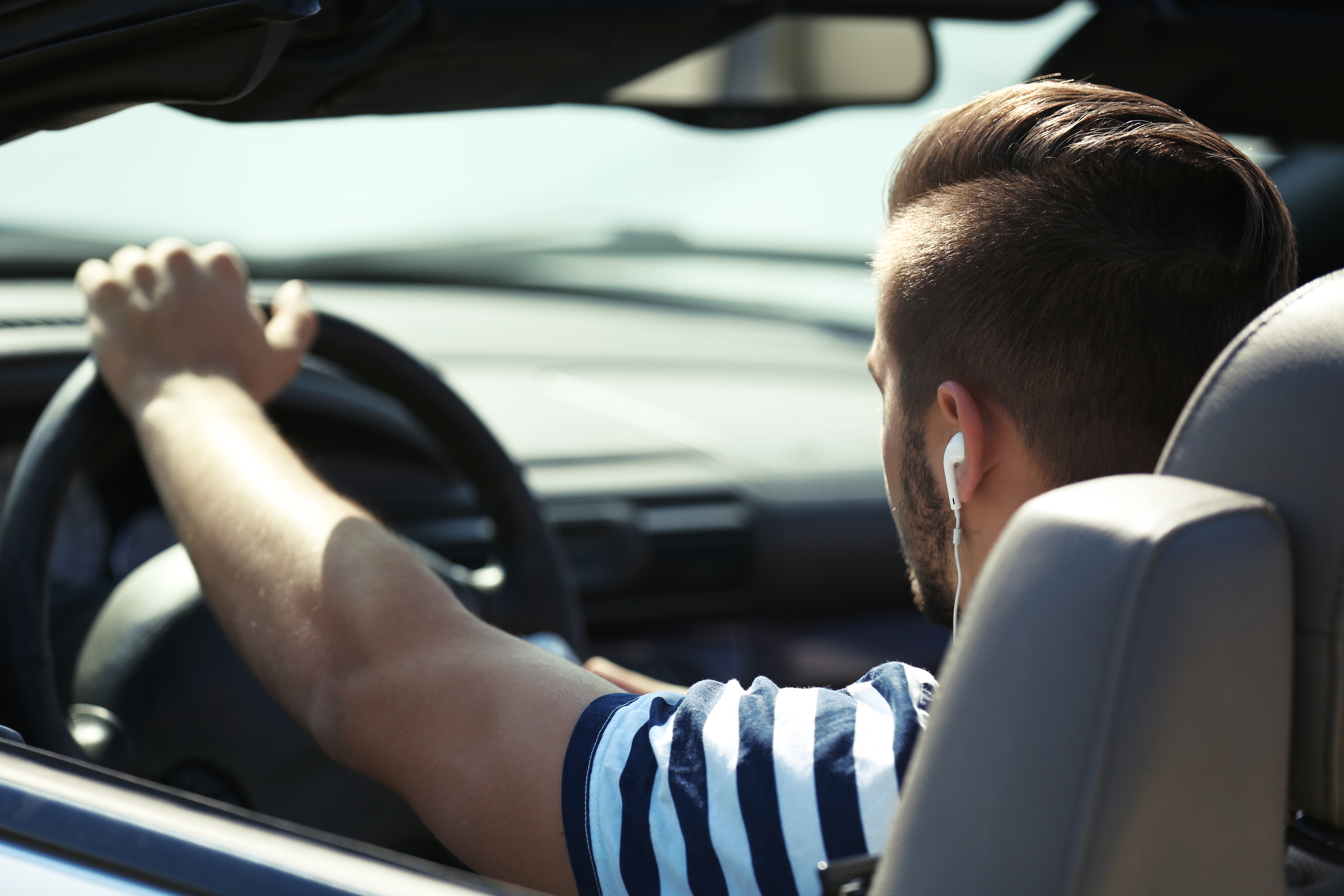 A man driving a car | Source: Shutterstock