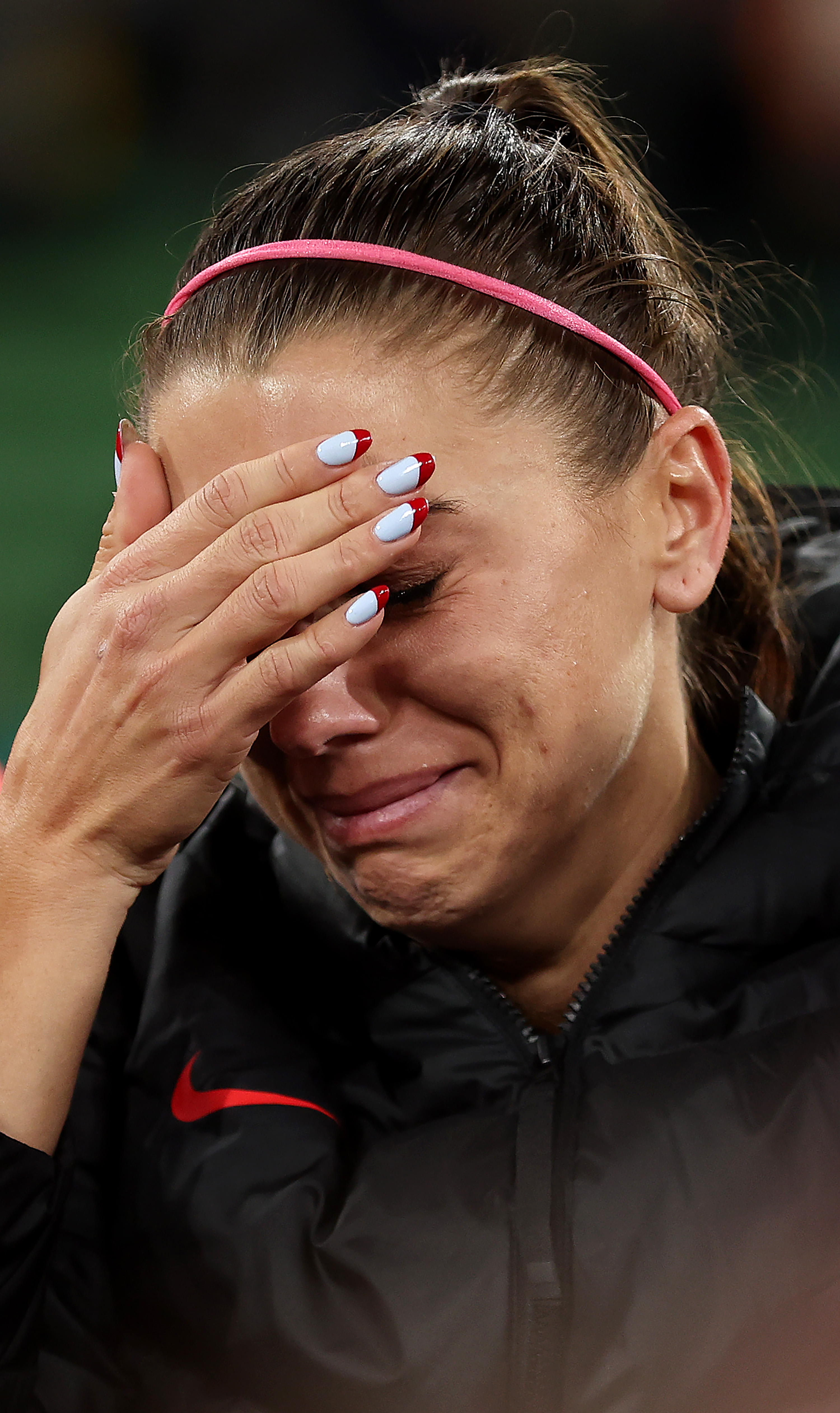 Alex Morgan reacts to her team being knocked out of the tournament after a penalty shoot-out loss during the FIFA Women's World Cup Australia & New Zealand 2023 Round of 16 match between Sweden and USA in Melbourne, Australia, on August 6, 2023. | Source: Getty Images