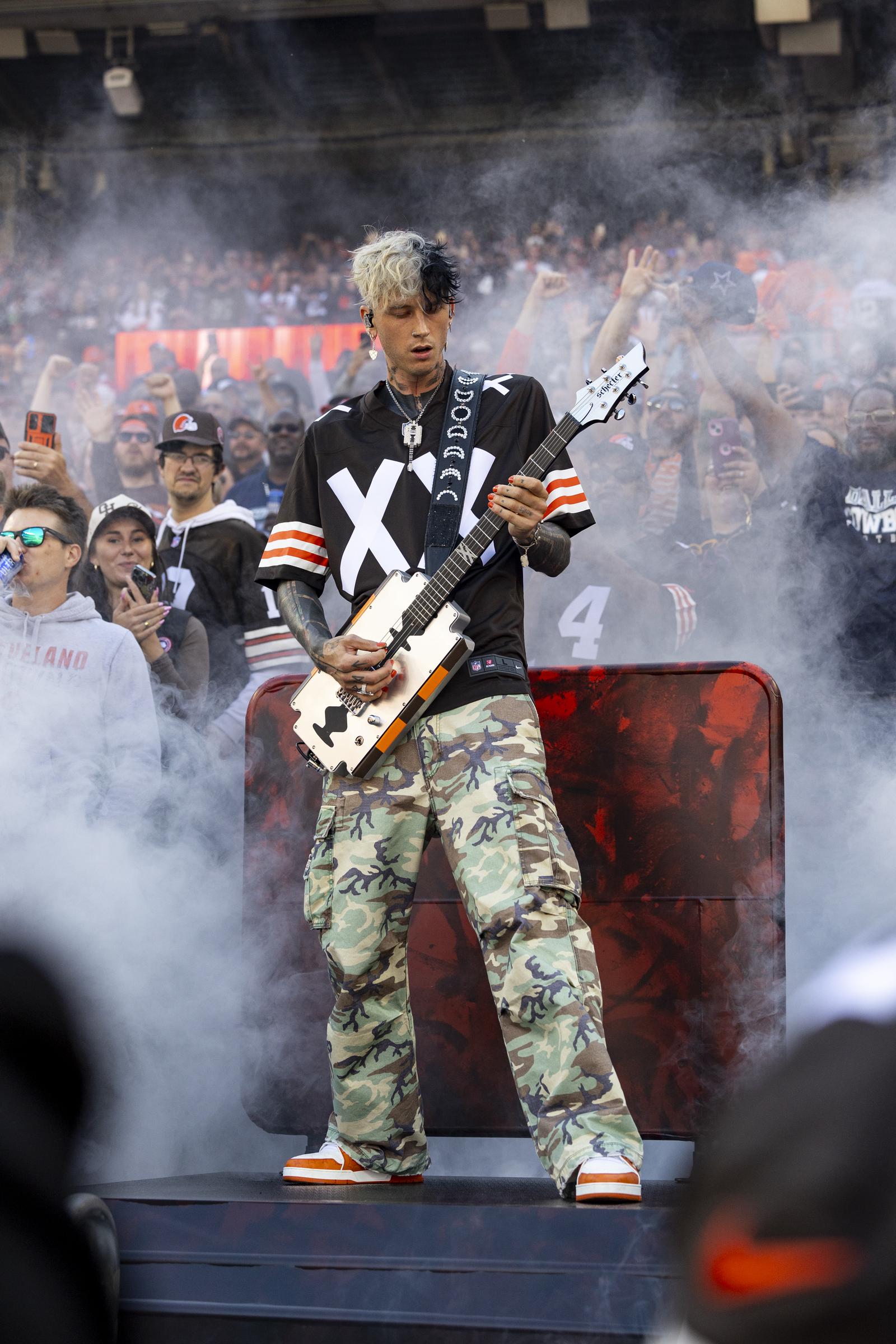 Machine Gun Kelly performs before the Cleveland Browns home game against the Dallas Cowboys at Huntington Bank Field in Cleveland, Ohio, on September 8, 2024 | Source: Getty Images