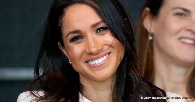 Meghan Markle wows the public with her total 'boss' look in a sleek black pantsuit