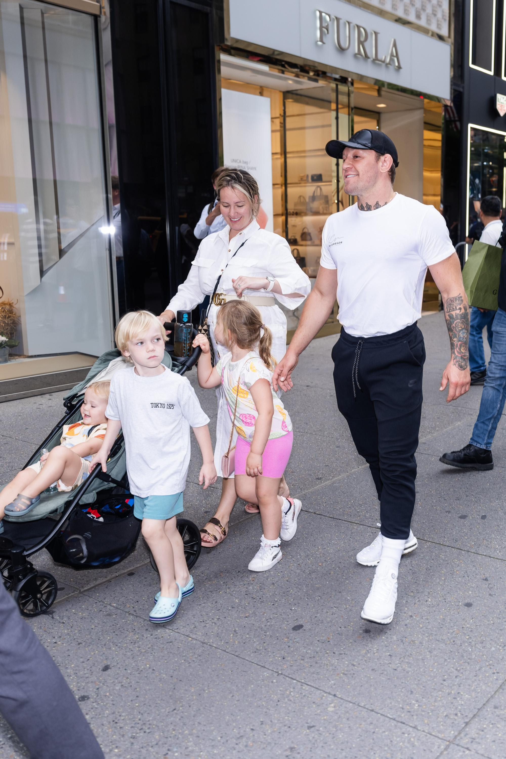 Dee Devlin and Conor McGregor spotted with their children in Midtown on July 12, 2023, in New York. | Source: Getty Images