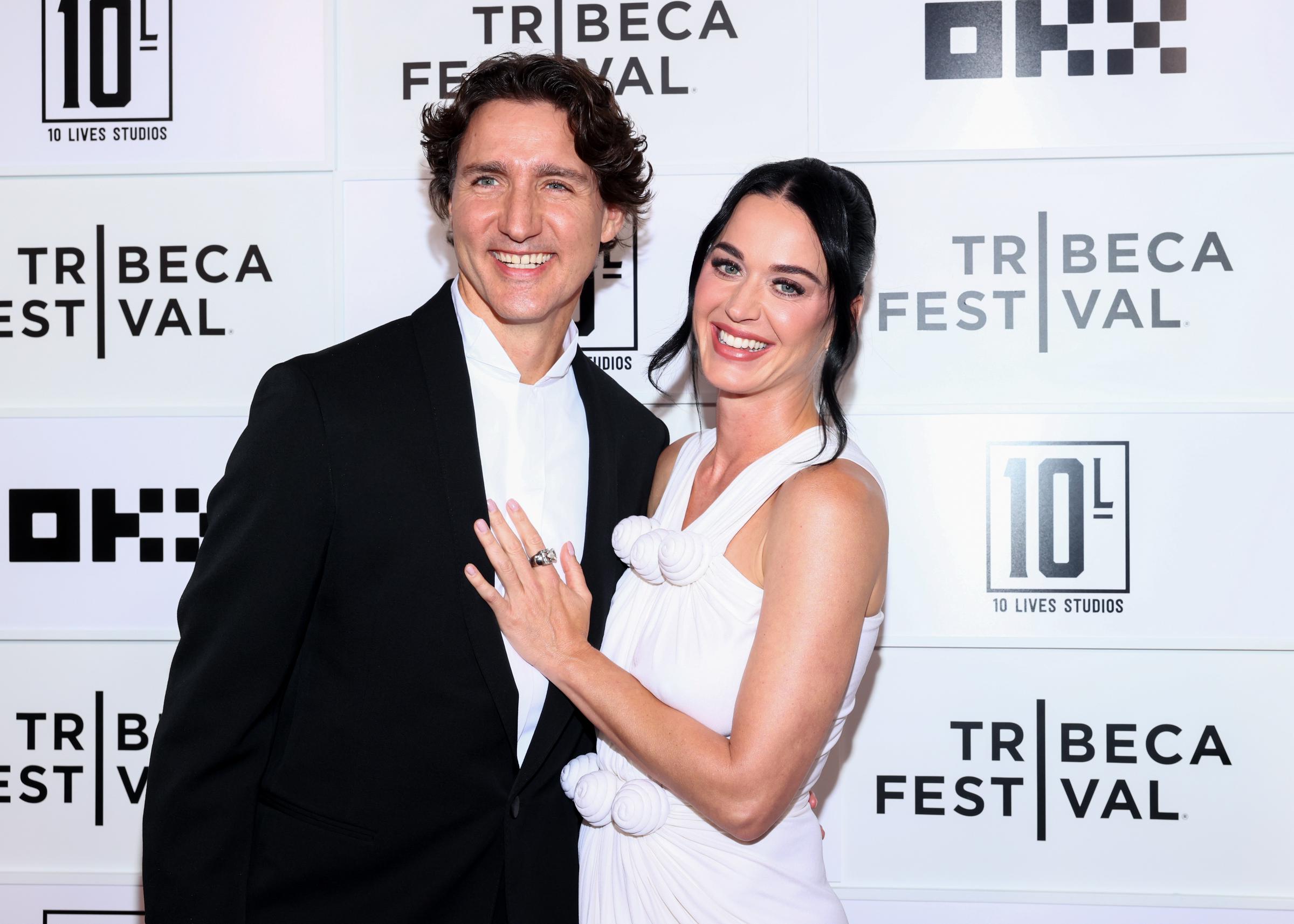 All smiles. Katy Perry and Justin Trudeau appeared relaxed and affectionate as they made their first official red carpet appearance together at the Tribeca Festival premiere. | Source: Getty Images