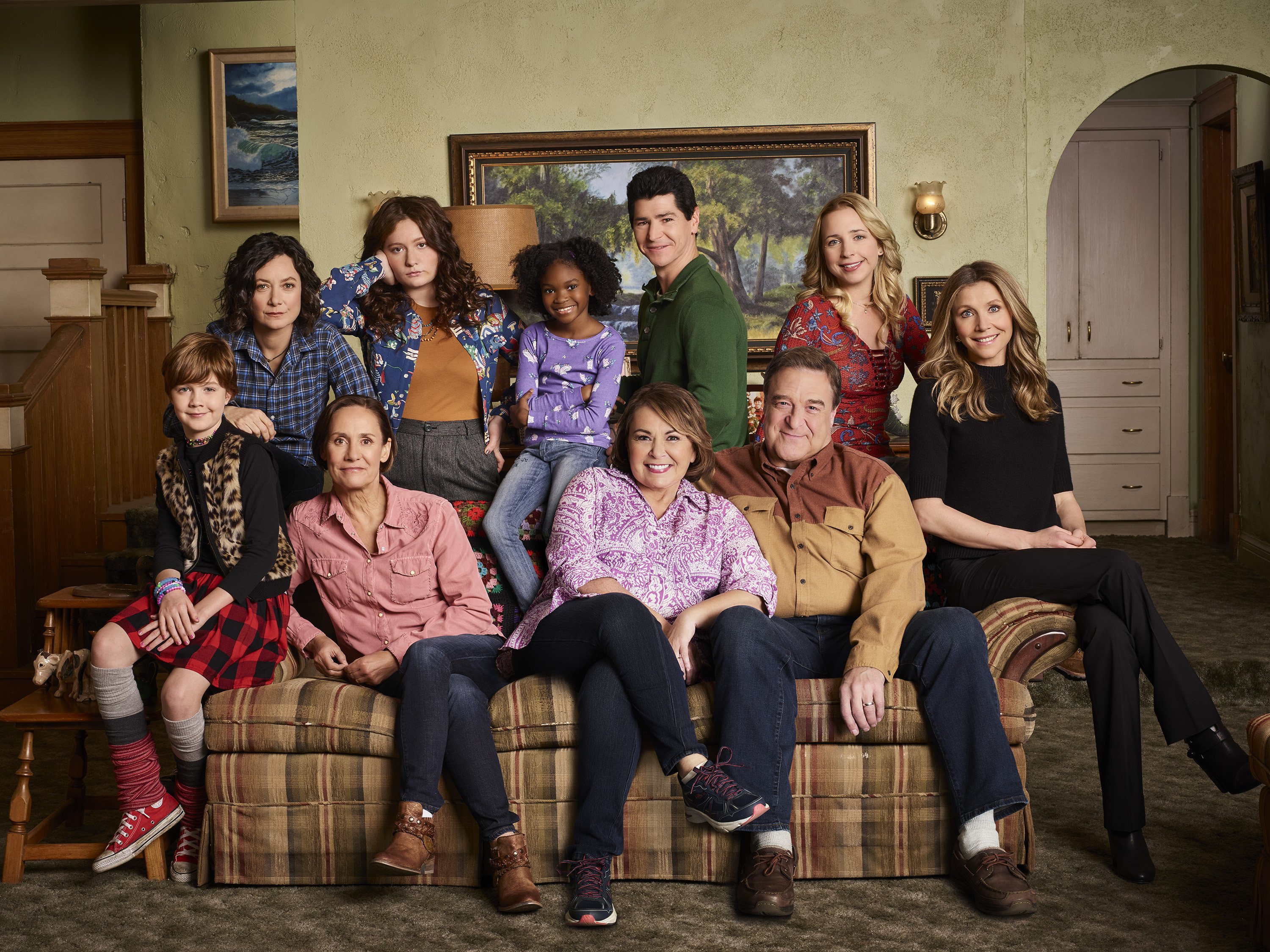 Ames McNamara as Mark, Sara Gilbert as Darlene Conner, Laurie Metcalf as Jackie Harris, Emma Kenney as Harris Conner, Jayden Rey as Mary, Roseanne Barr as Roseanne Conner, Michael Fishman as D.J. Conner, John Goodman as Dan Conner, Lecy Goranson as Becky Conner, and Sarah Chalke as Andrea on the "Roseanne" reboot in 2017 | Source: Getty Images 