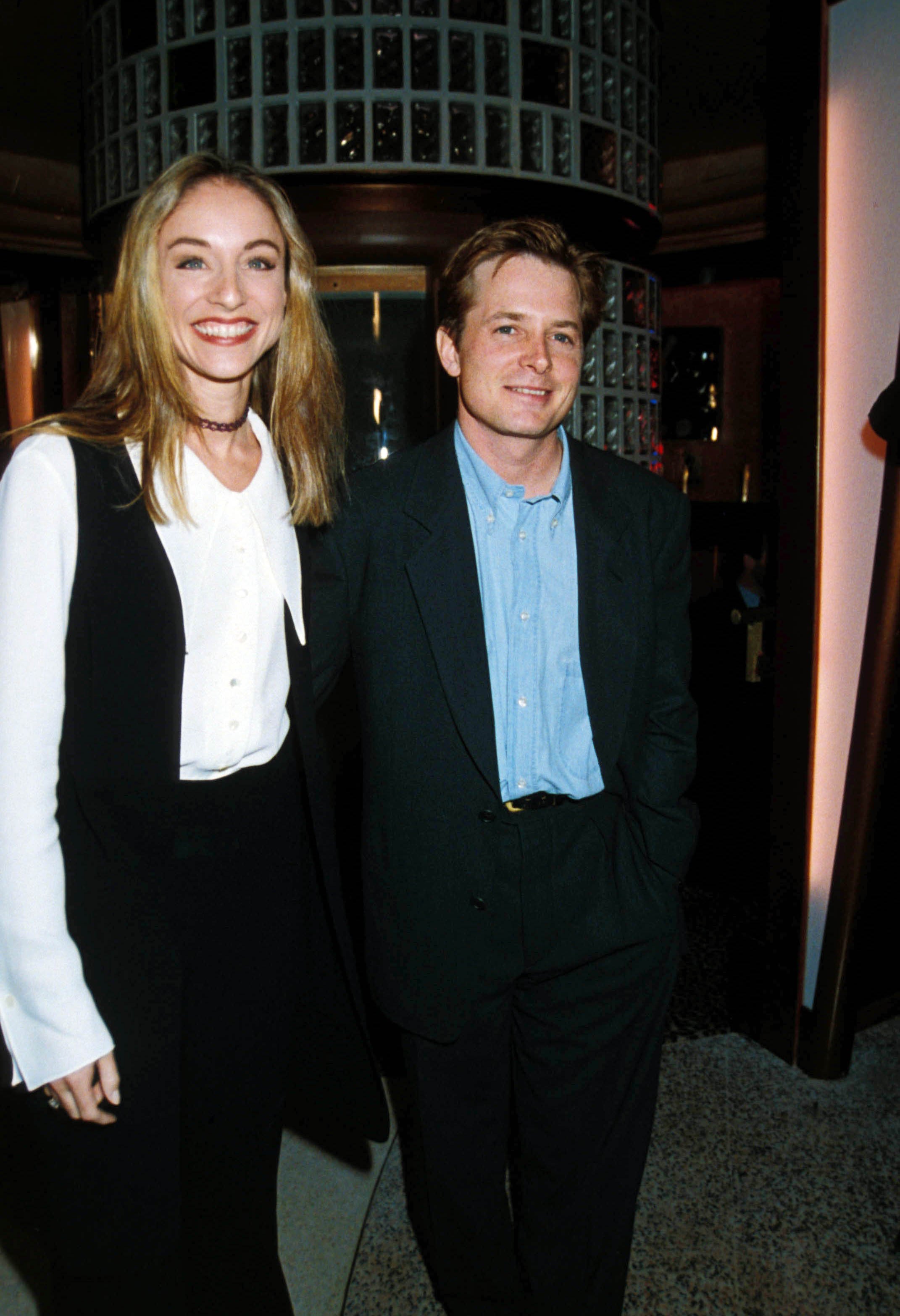 Michael J Fox With Wife Tracy Pollan At Planet Hollywood In London, circa 1991. | Source: Getty Images