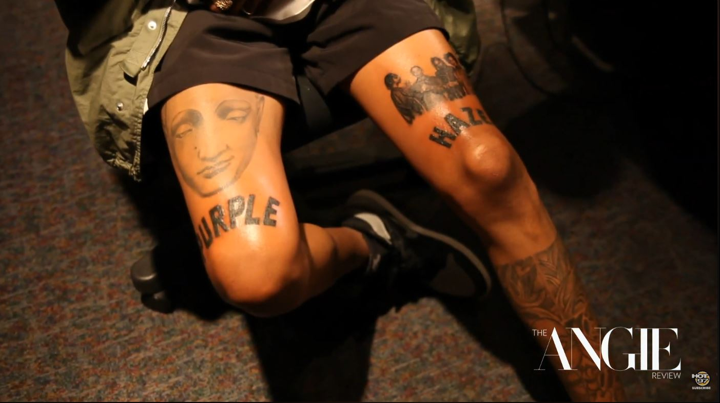 Wiz Khalifa shows several leg tattoos dedicated to artists and cultural figures who influenced him throughout his life and career. | Source: YouTube/Hot 97