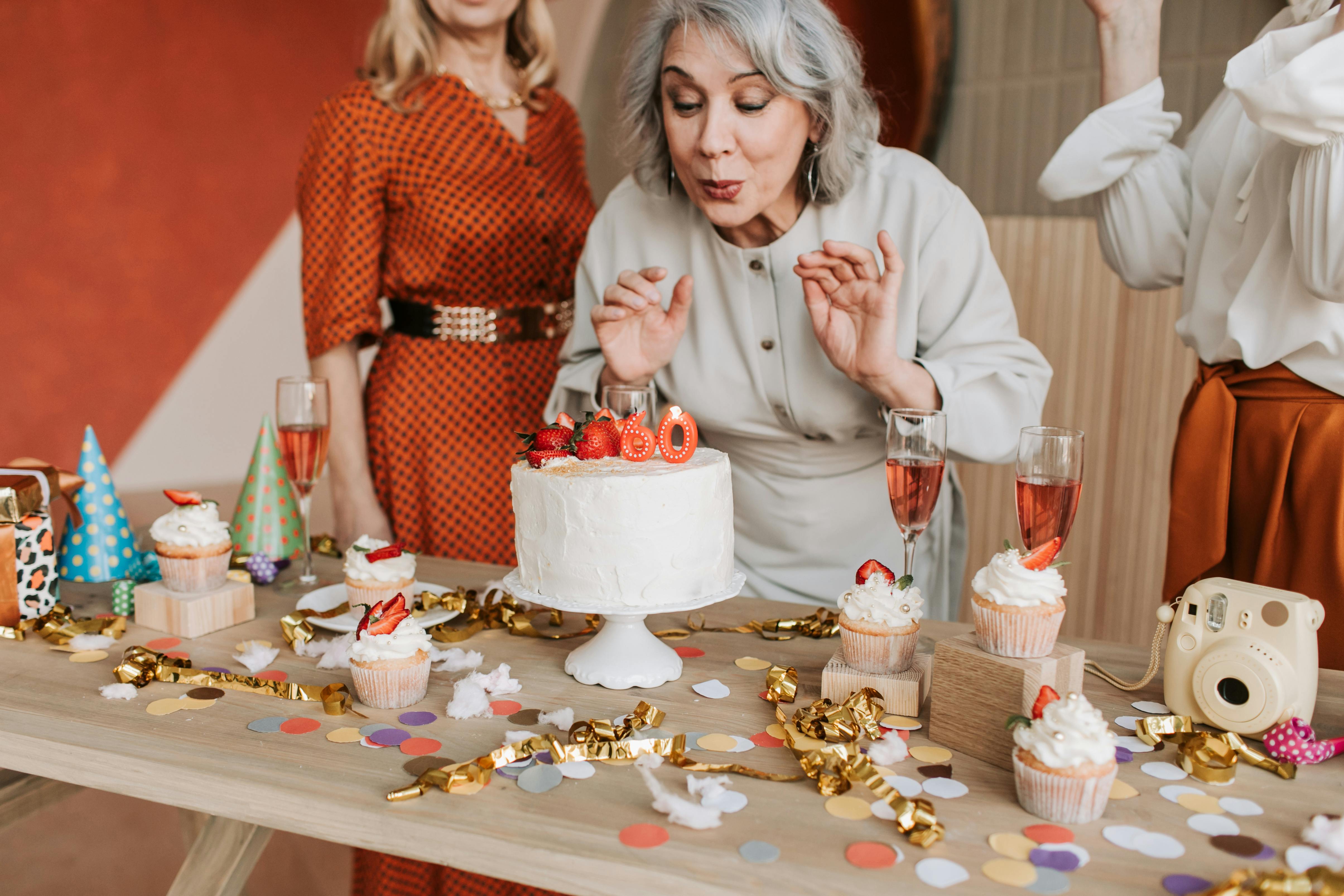 A woman celebrating with friends | Source: Pexels