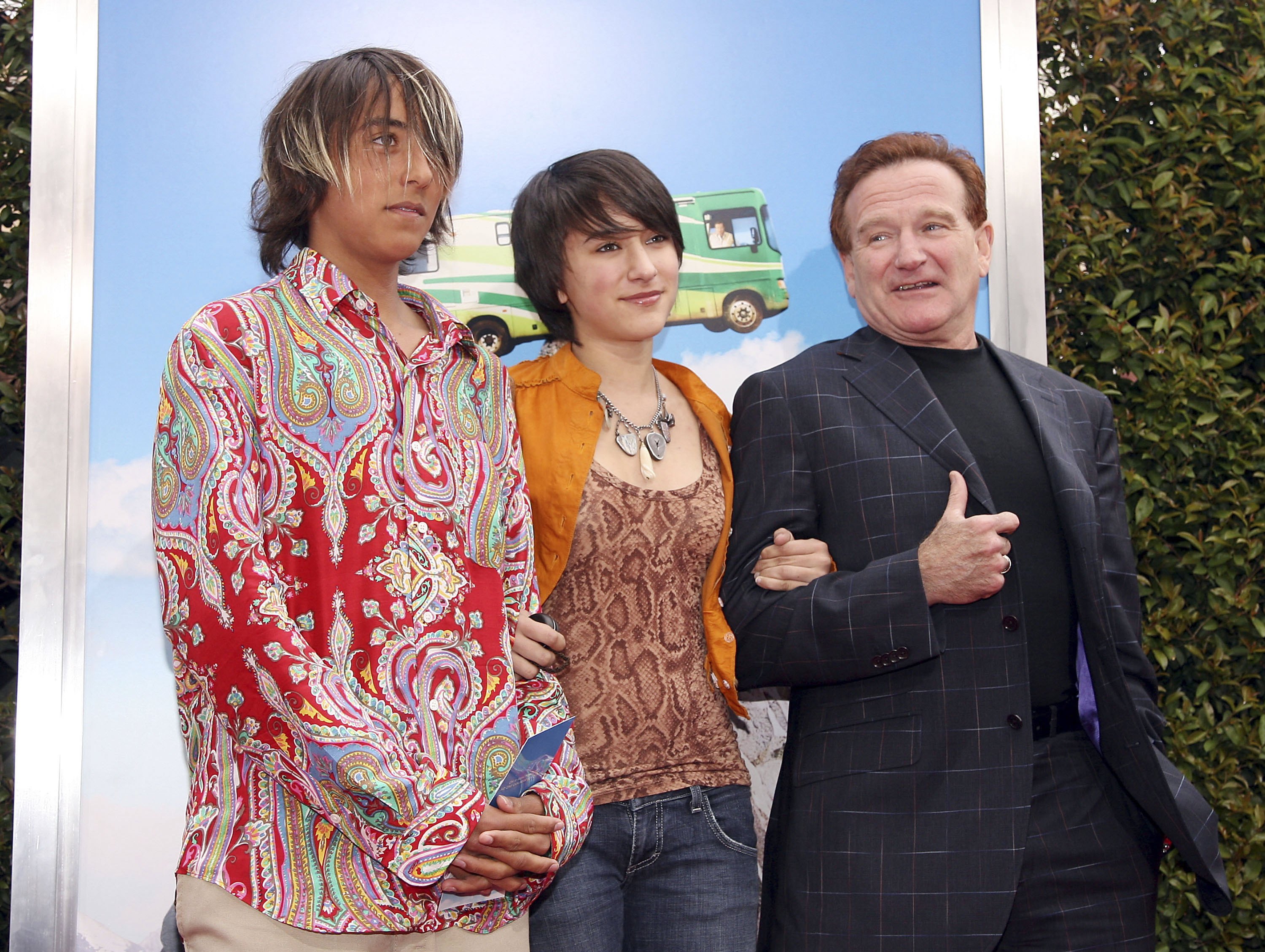 Actor Robin Williams (R) and his son Cody (L) and daughter Zelda  at the Village Theater on April 23, 2006, in Los Angeles, California. | Source: Getty Images