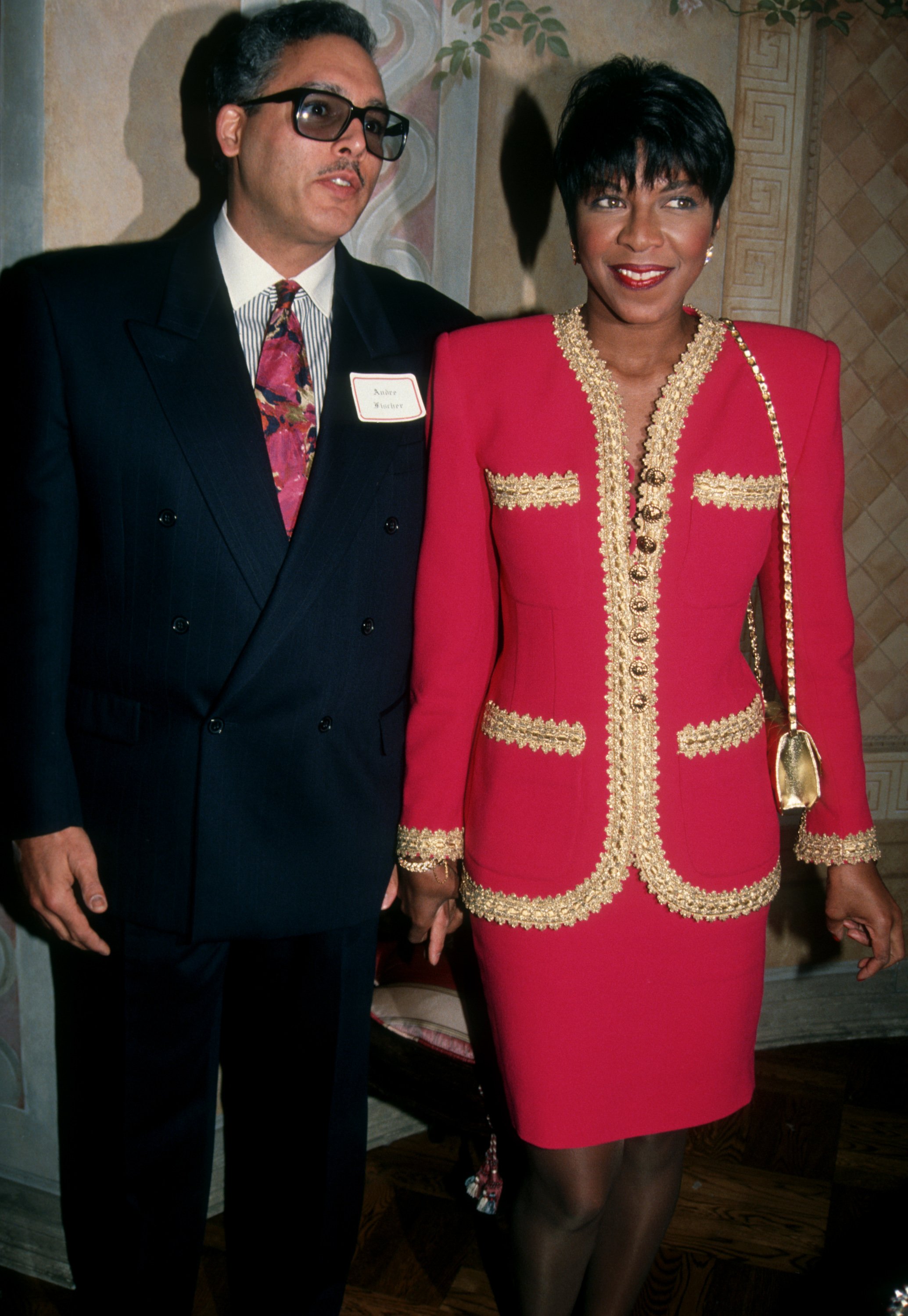 Natalie Cole and husband Andre Fischer attending "Casey Kasem's Christmas Party" on December 21, 1991 at Casey Kasem's Home in Bel Air, California | Source: Getty Images