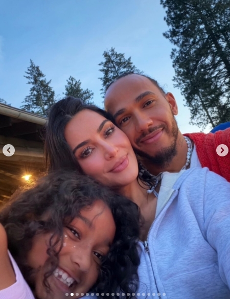 Kim Kardashian poses with her daughter, Chicago, and Lewis Hamilton in a post dated July 13, 2026. | Source: Instagram/kimkardashian