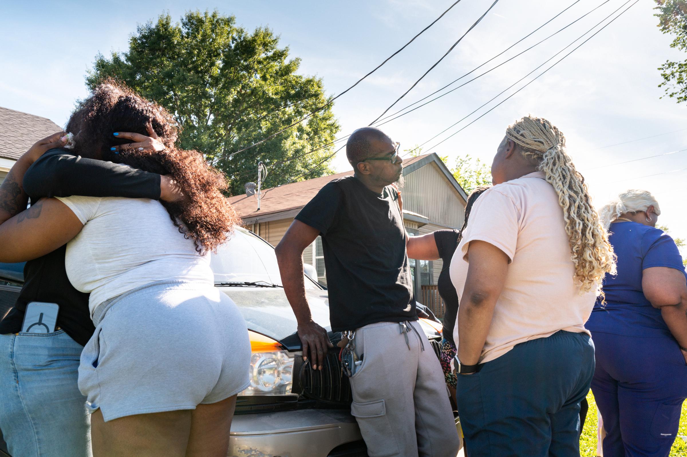 Community members gather outside a home following a shooting that left eight children dead in Shreveport on April 19, 2026 | Source: Getty Images