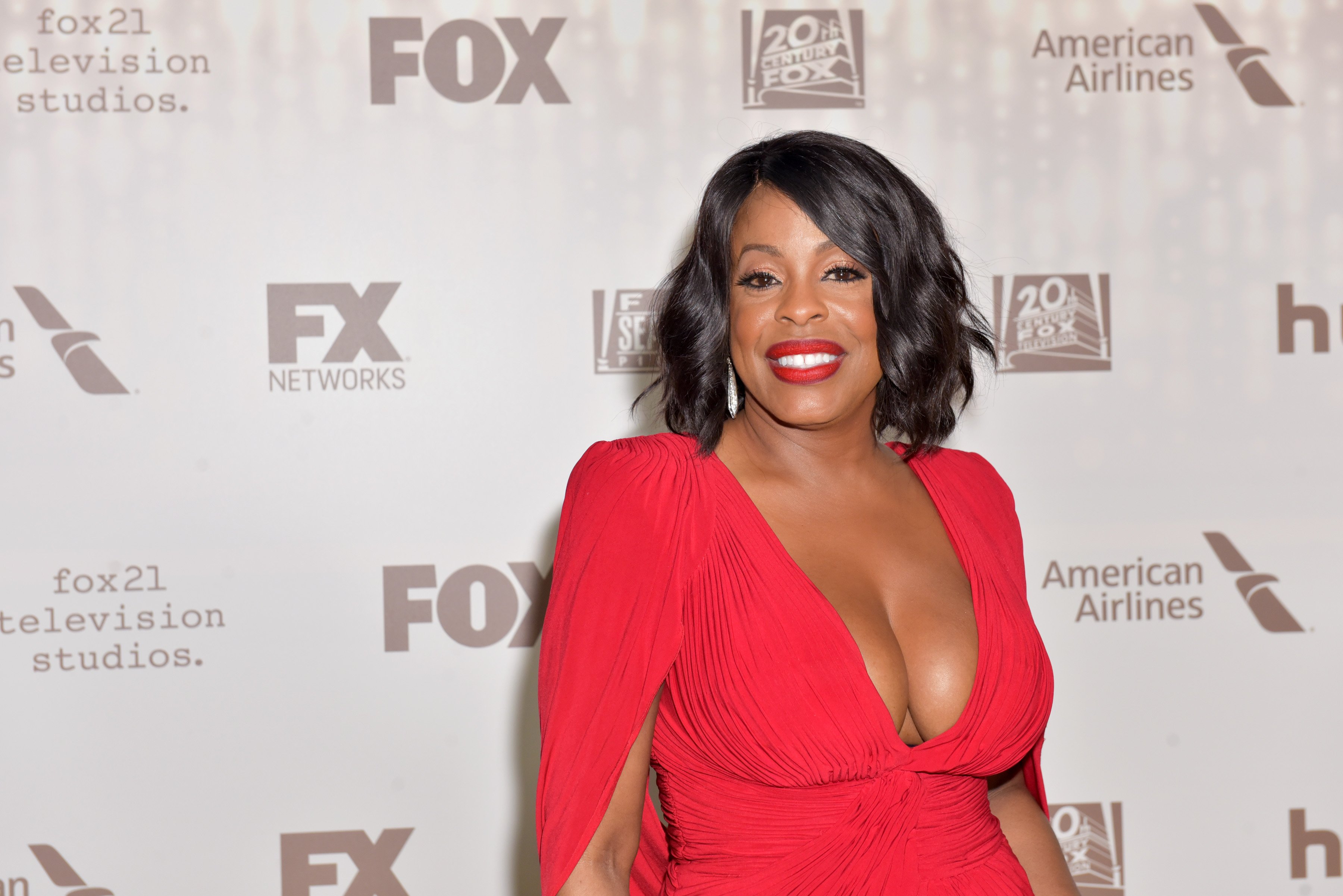 Niecy Nash Sets Hearts Racing on a Yacht Showing Her Long Legs in a
