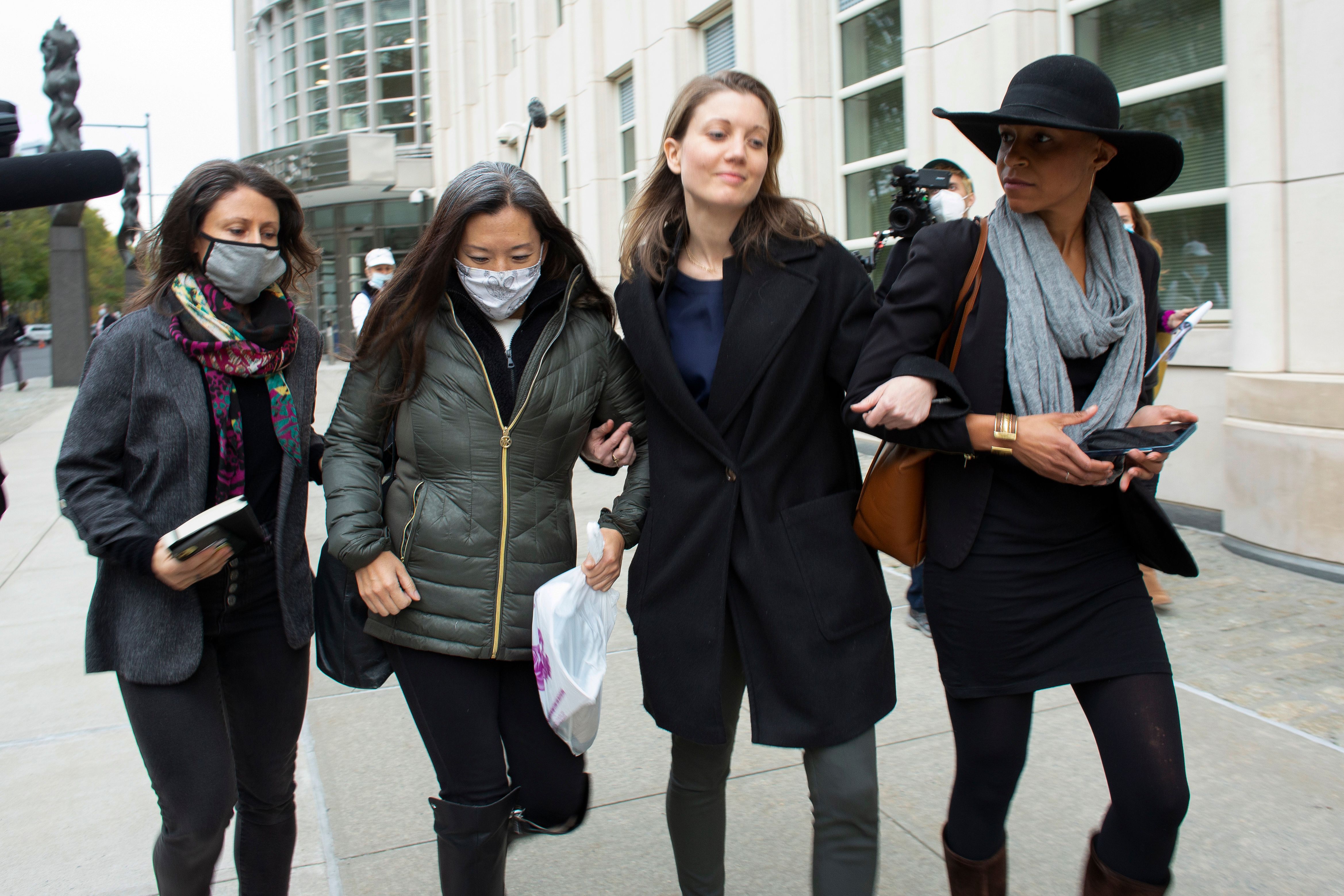 Nicki Clyne and others leave the New York court after Keith Rainiere was sentenced to 120 years in prison on October 27, 2020 | Photo: Kena Betancur/AFP/Getty Images