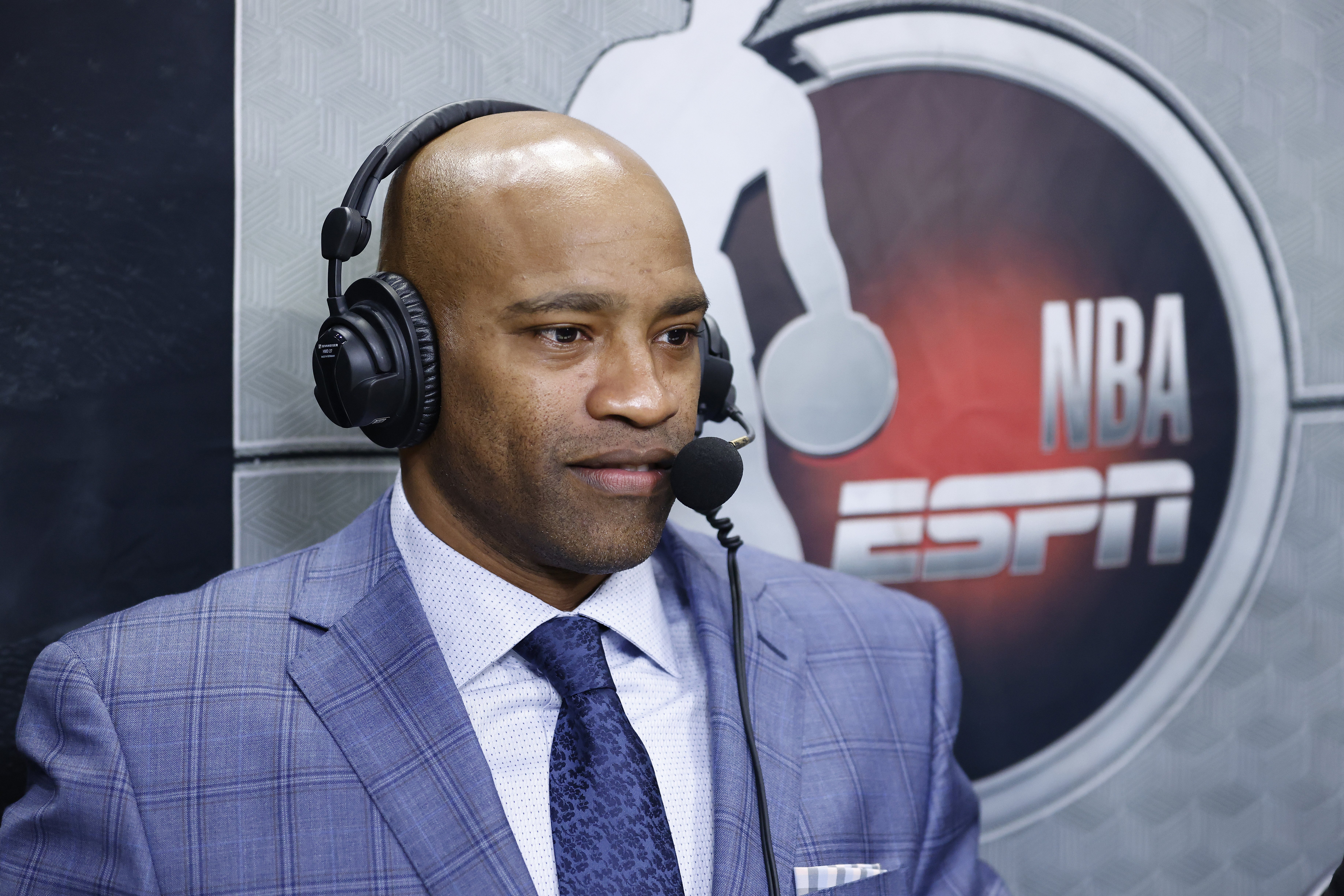 ESPN commentator Vince Carter looks on prior to a preseason game between the Miami Heat and the Boston Celtics at FTX Arena on October 15, 2021 in Miami, Florida. | Source: Getty Images