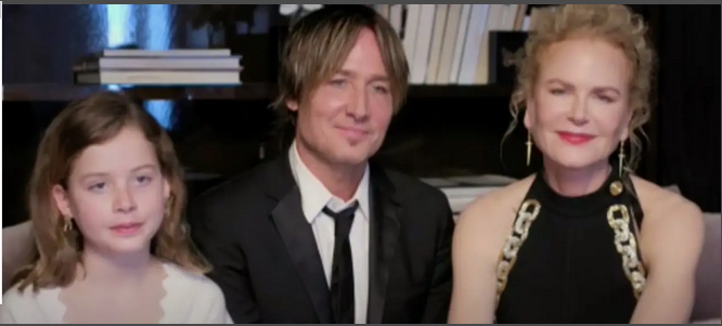 Keith Urban, Nicole Kidman, and their daughter Faith at the Golden Globes Awards, from a video dated March 1, 2021 | Source: youtube.com/@EntertainmentTonight