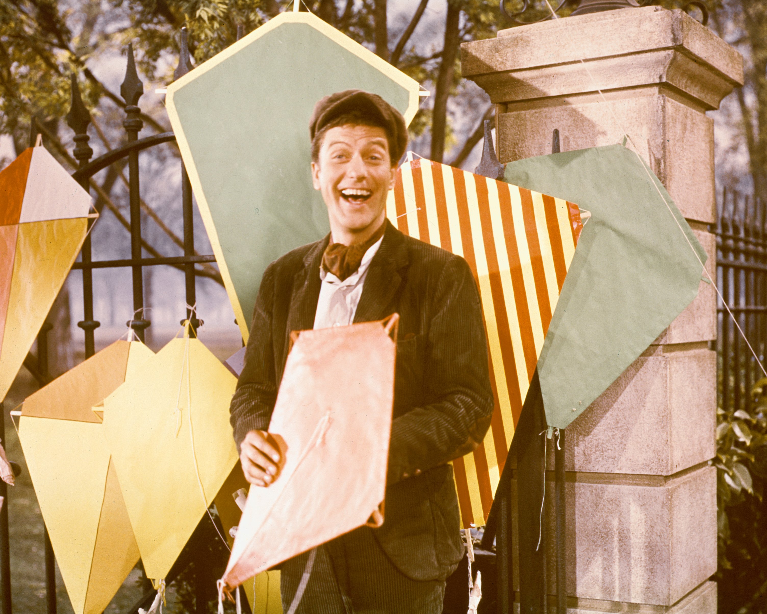 Dick Van Dyke, poses as Bert with a variety of kites in a publicity still for the film, "Mary Poppins", USA, 1964. | Source: Getty Images