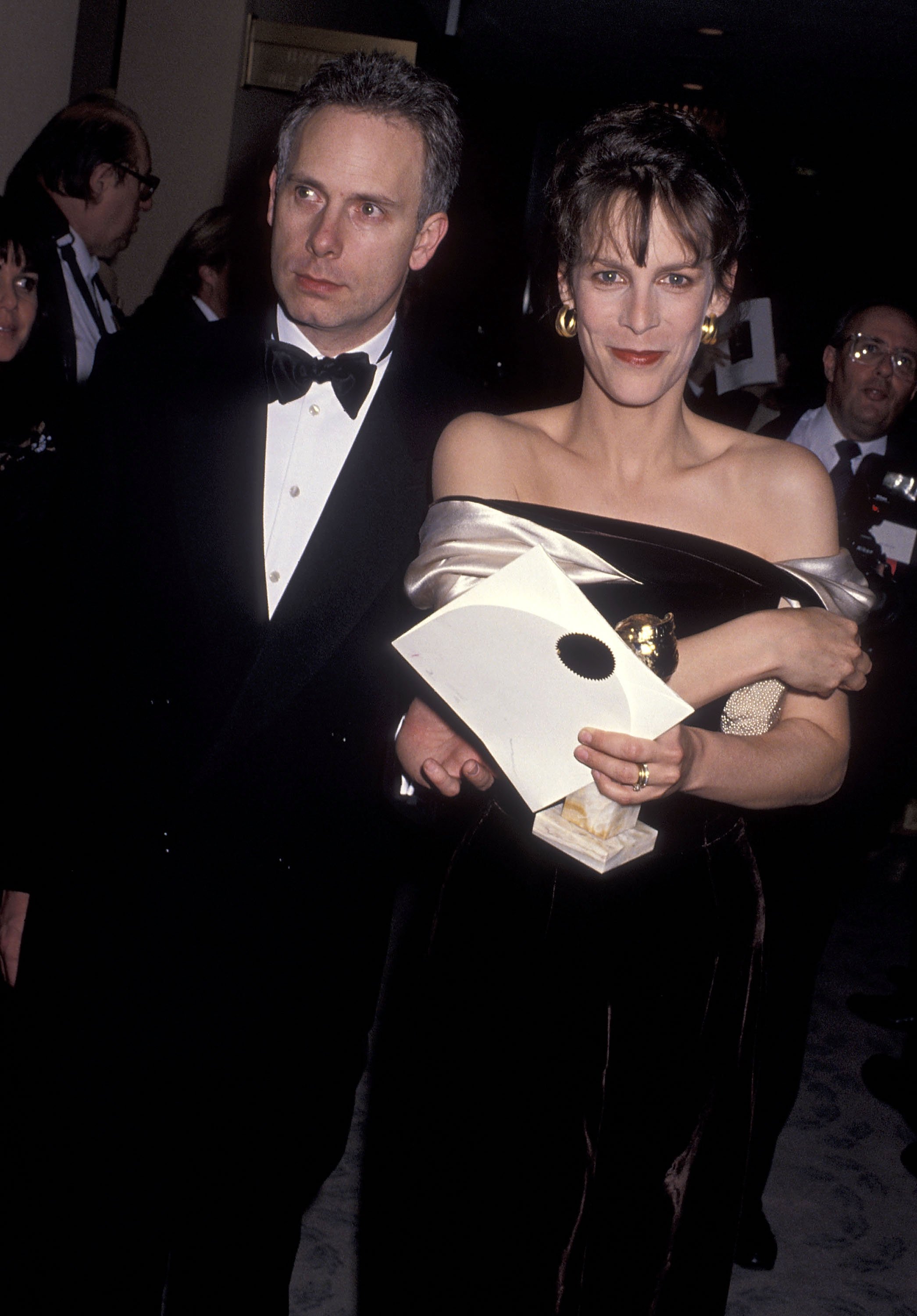 Actor/Writer Christopher Guest and actress Jamie Lee Curtis attend the 47th Annual Golden Globe Awards on January 20, 1990 at Beverly Hilton Hotel in Beverly Hills, California. | Source: Getty Images