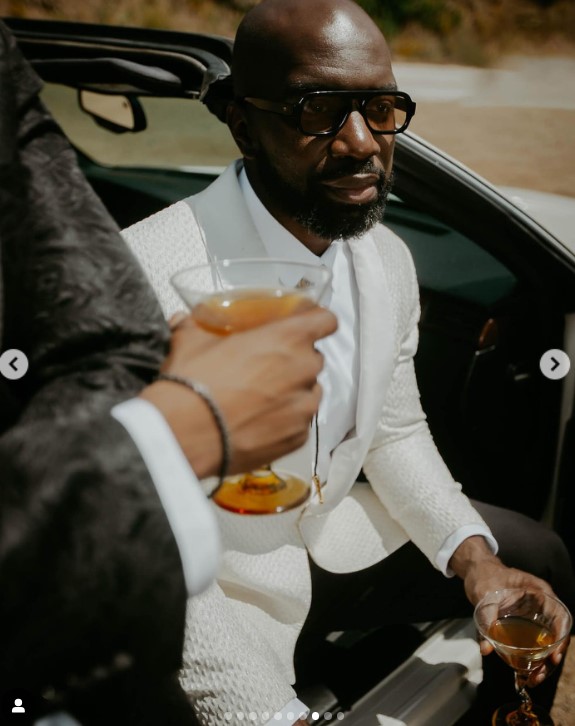 Greg Mathis Jr. and Elliott Cooper posing for their engagement announcement photoshoot in an image uploaded on July 19, 2024 | Source: Instagram/gregmathisjr