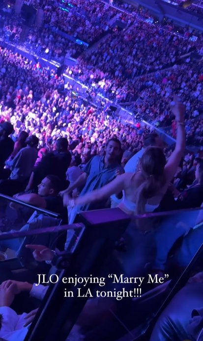 Jennifer Lopez holds her head high as she dances along to Bruno Mars' song "Marry You" at his concert in Los Angeles, California, posted in August 2024 | Source: Instagram/itstetrisbish