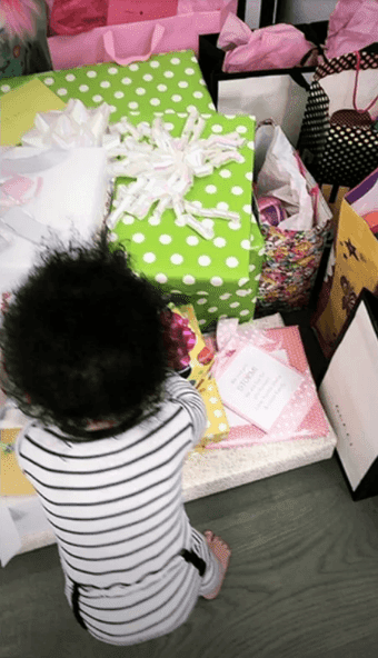 Stormi looking at her mountain of presents | Instagram stories: Kylie Jenner