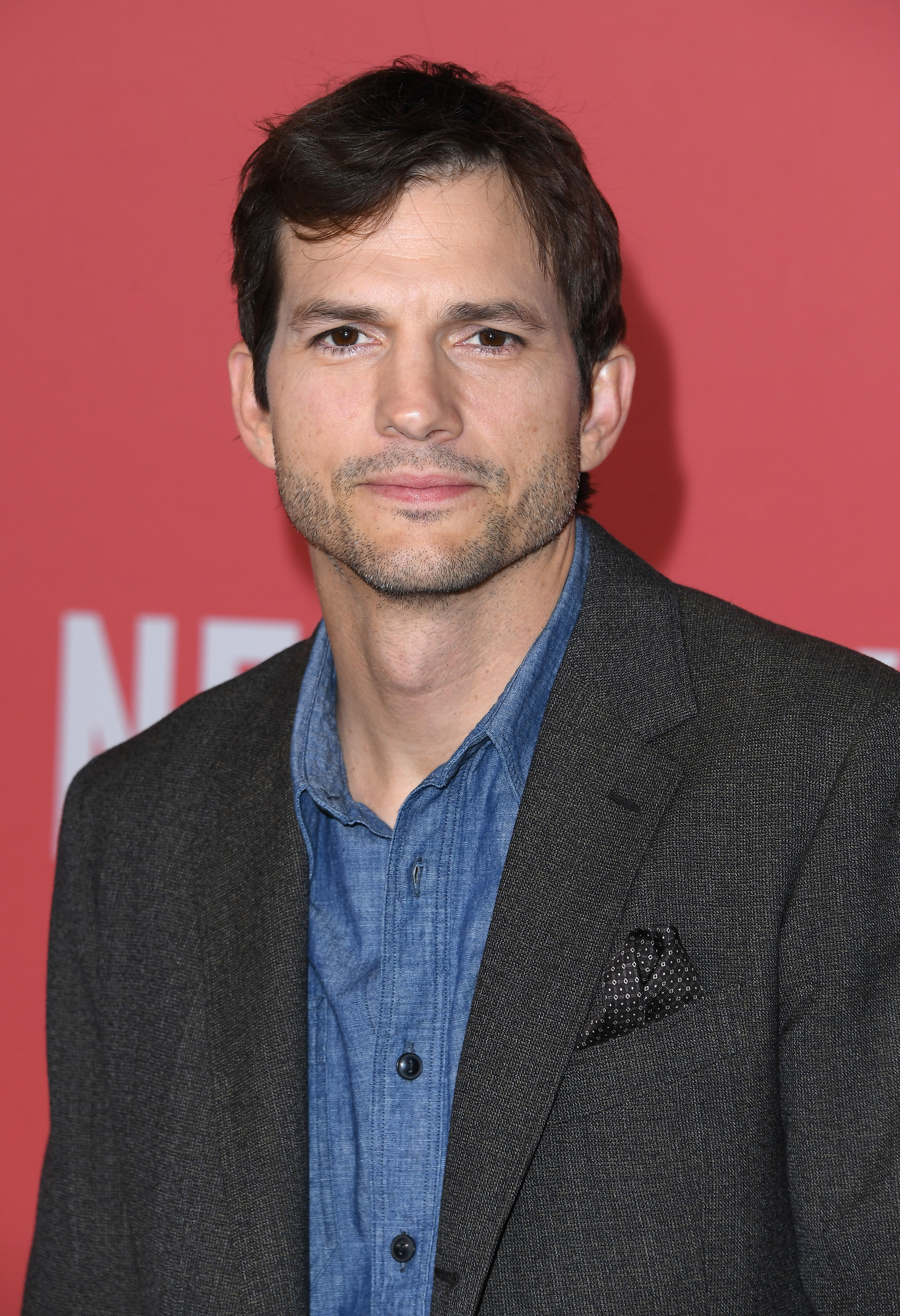 Ashton Kutcher arrives at the World Premiere Of Netflix's "Your Place Or Mine" in Los Angeles, California, on February 2, 2023. | Source: Getty Images