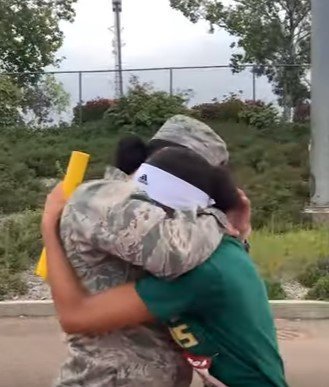 Photo of military officer and her daughter | Photo: Youtube / T&T Creative Media