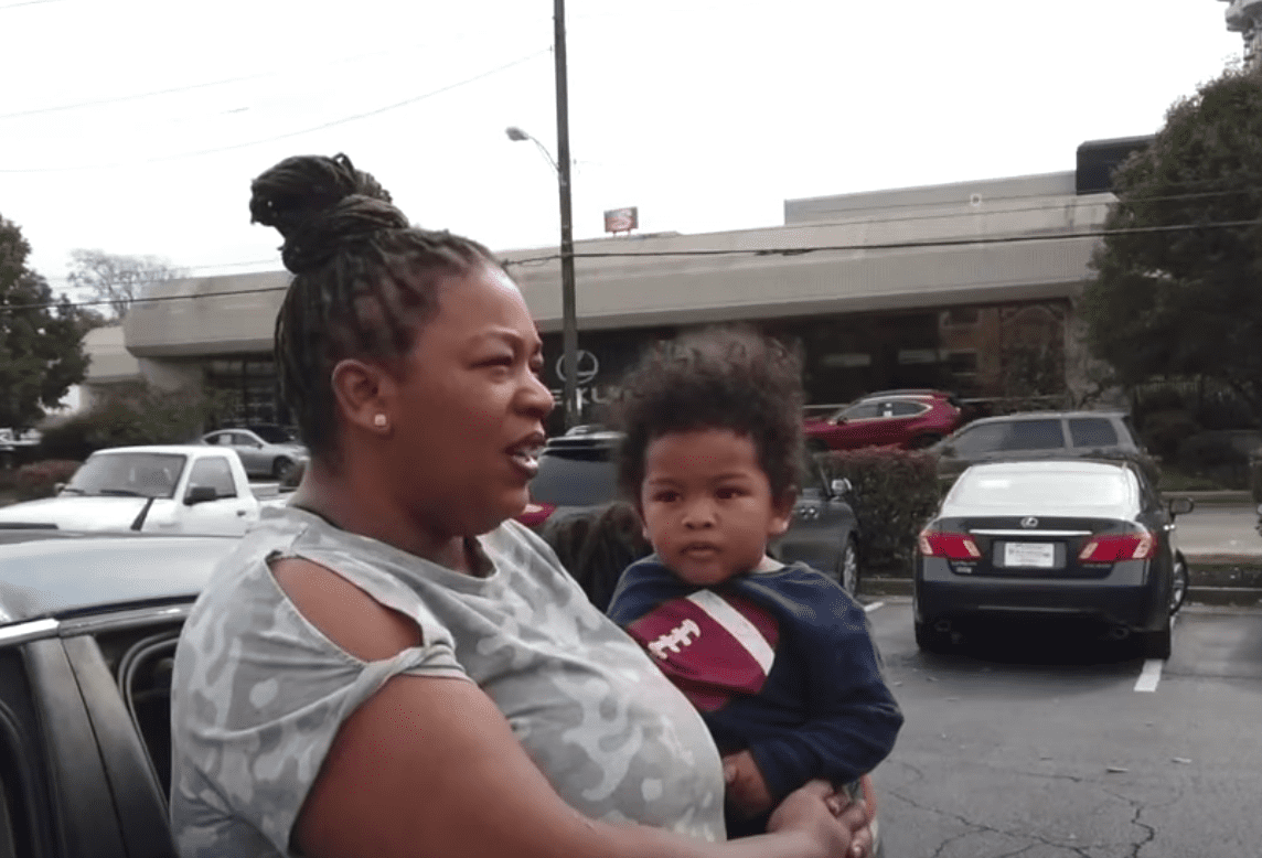 A mother and her baby who slept in their car due to homelessness | Photo: youtube.com/WCPO 9