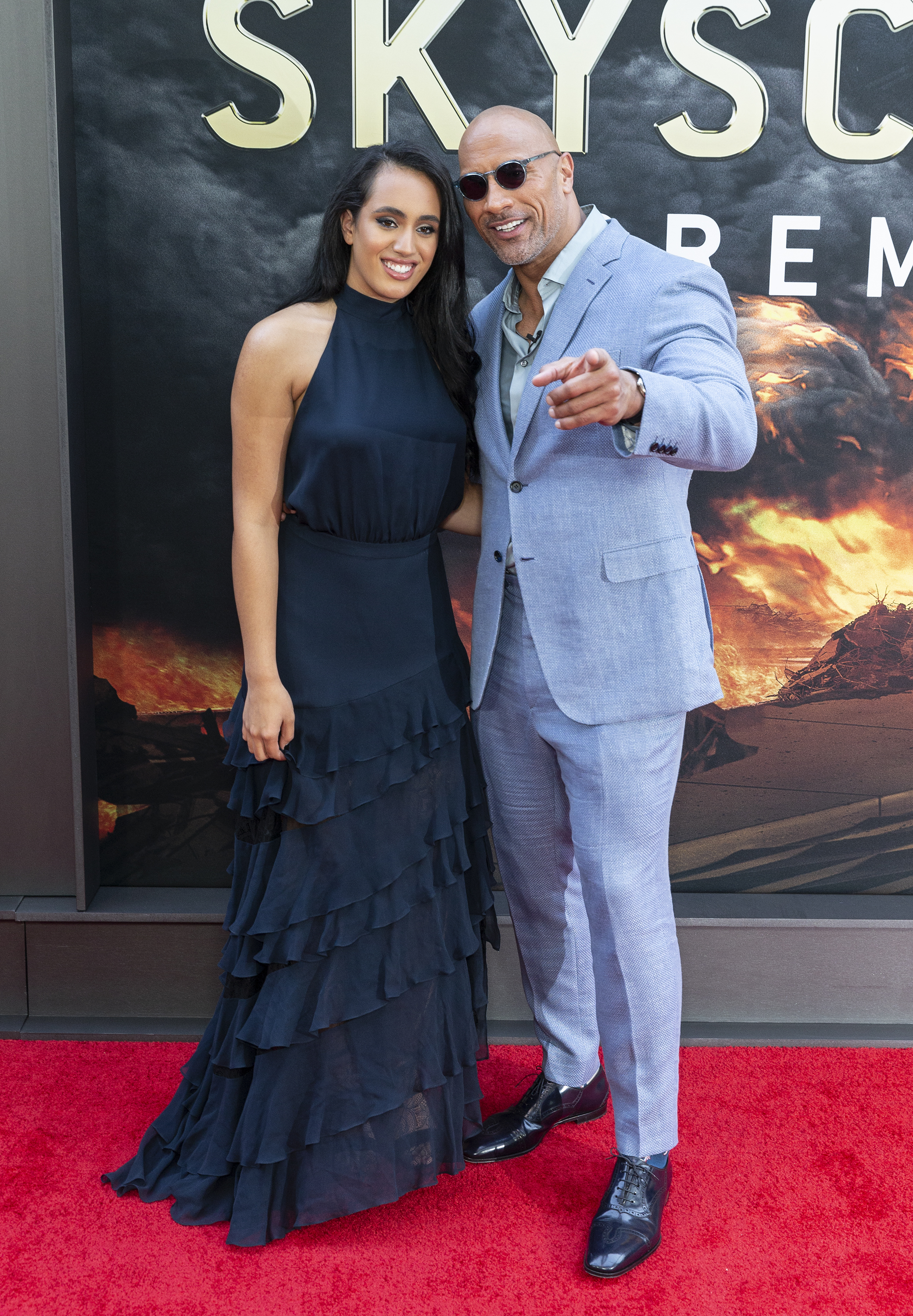 Simone and Dwayne Johnson attend the premiere of "Skyscraper" on July 10, 2018 | Source: Getty Images