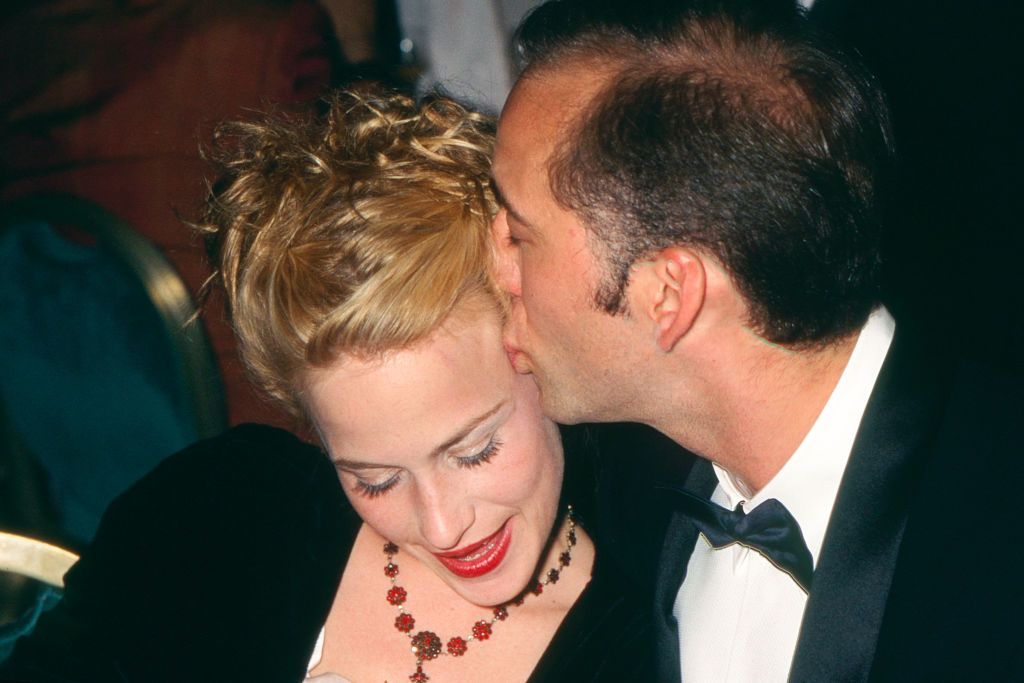 Patricia Arquette and Nicolas Cage at the Beyond Rangoon Party during the 48th Annual Cannes Film Festival on May 20, 1995, in France. | Source: Stephane Cardinale/Sygma/Getty Images