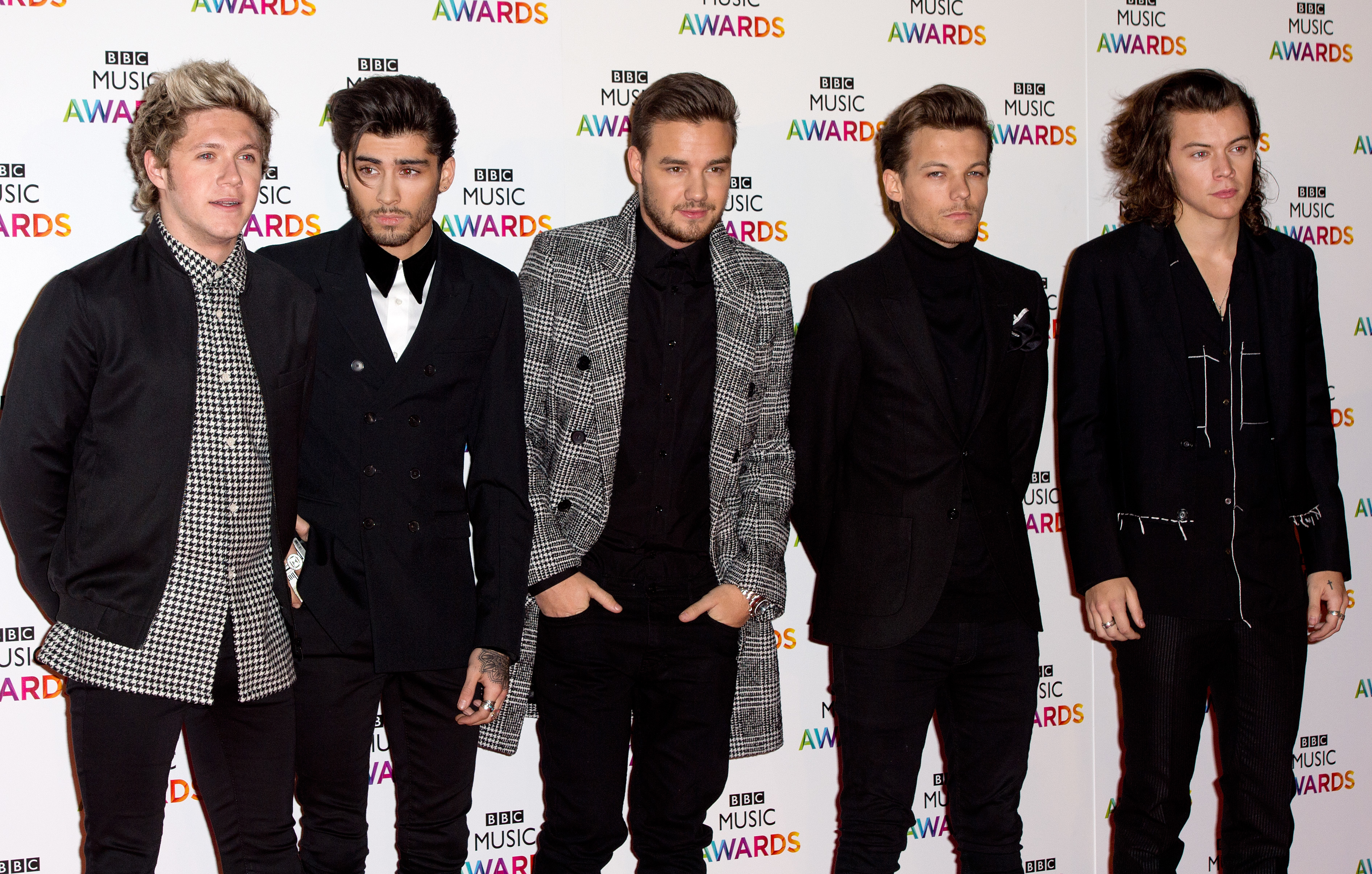 Niall Horan, Zayn Malik, Liam Payne, Louis Tomlinson and Harry Styles of One Direction arriving at the BBC Music Awards at Earls Court Arena in London on December 11, 2014. | Source: Getty Images