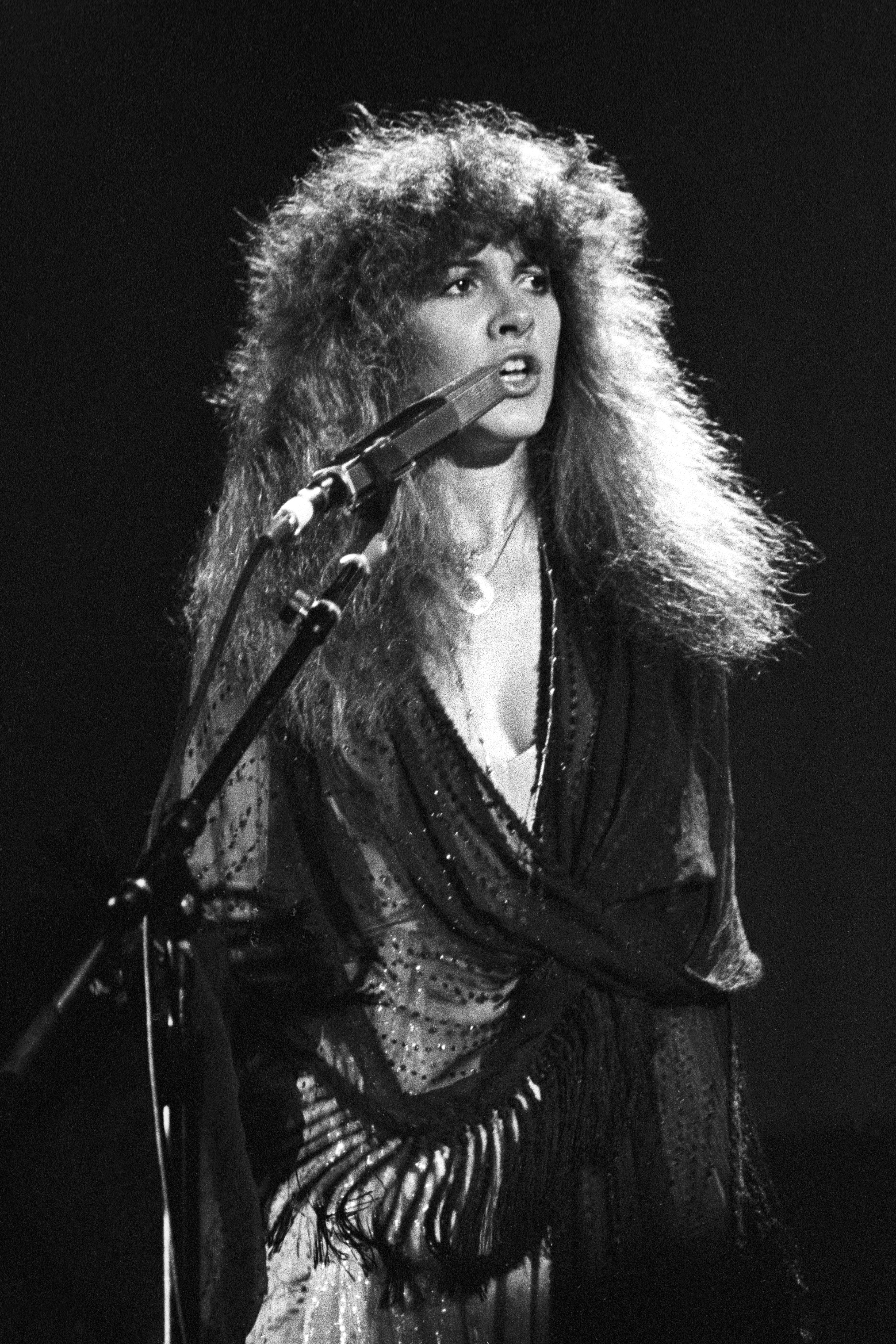 The artist performs with Fleetwood Mac at the Cow Palace on December 12, 1979 in San Francisco, California. | Source: Getty Images