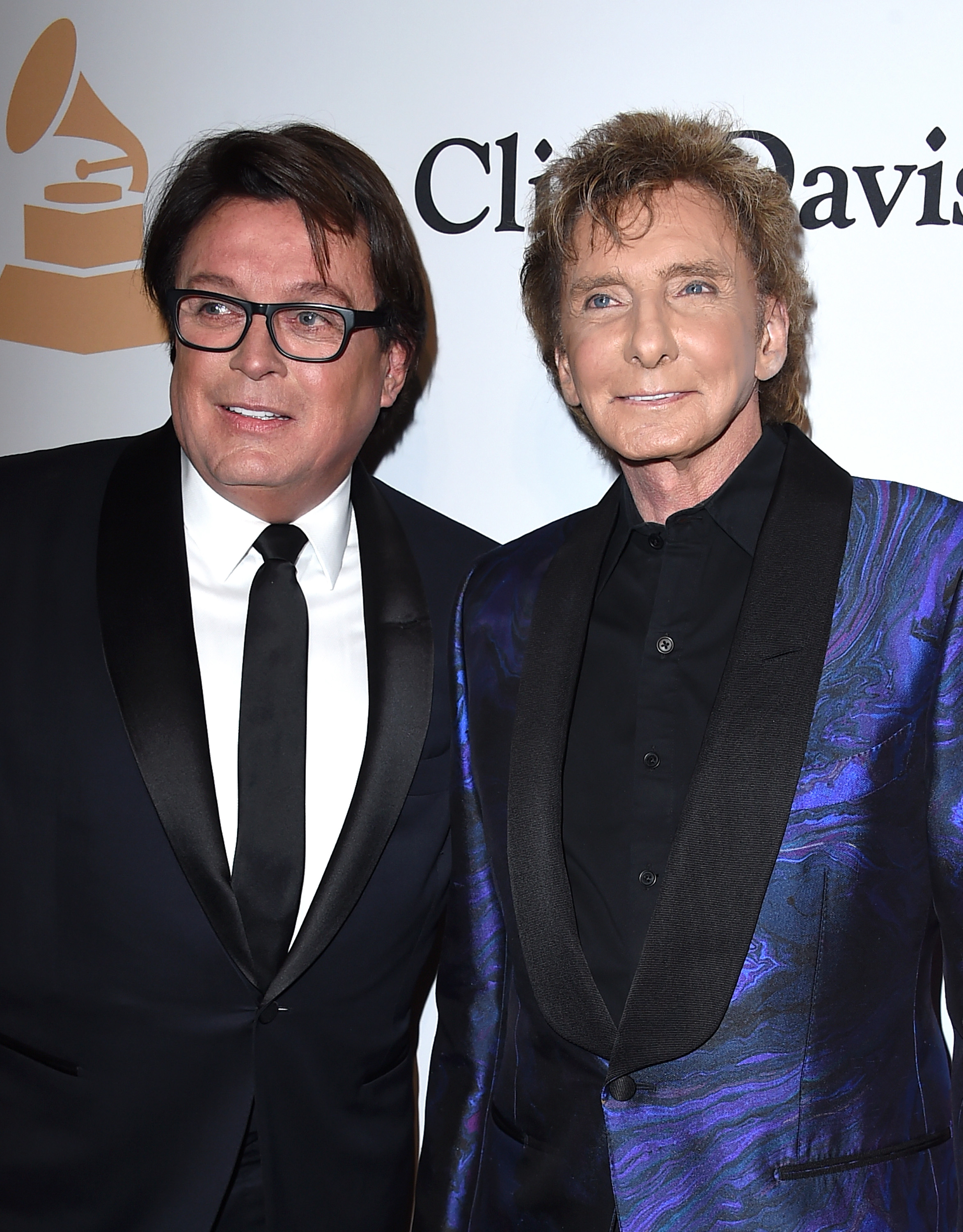 Garry Kief and Barry Manilow at the Pre-Grammy Gala in Beverly Hills, California on February 14, 2016 | Source: Getty Images