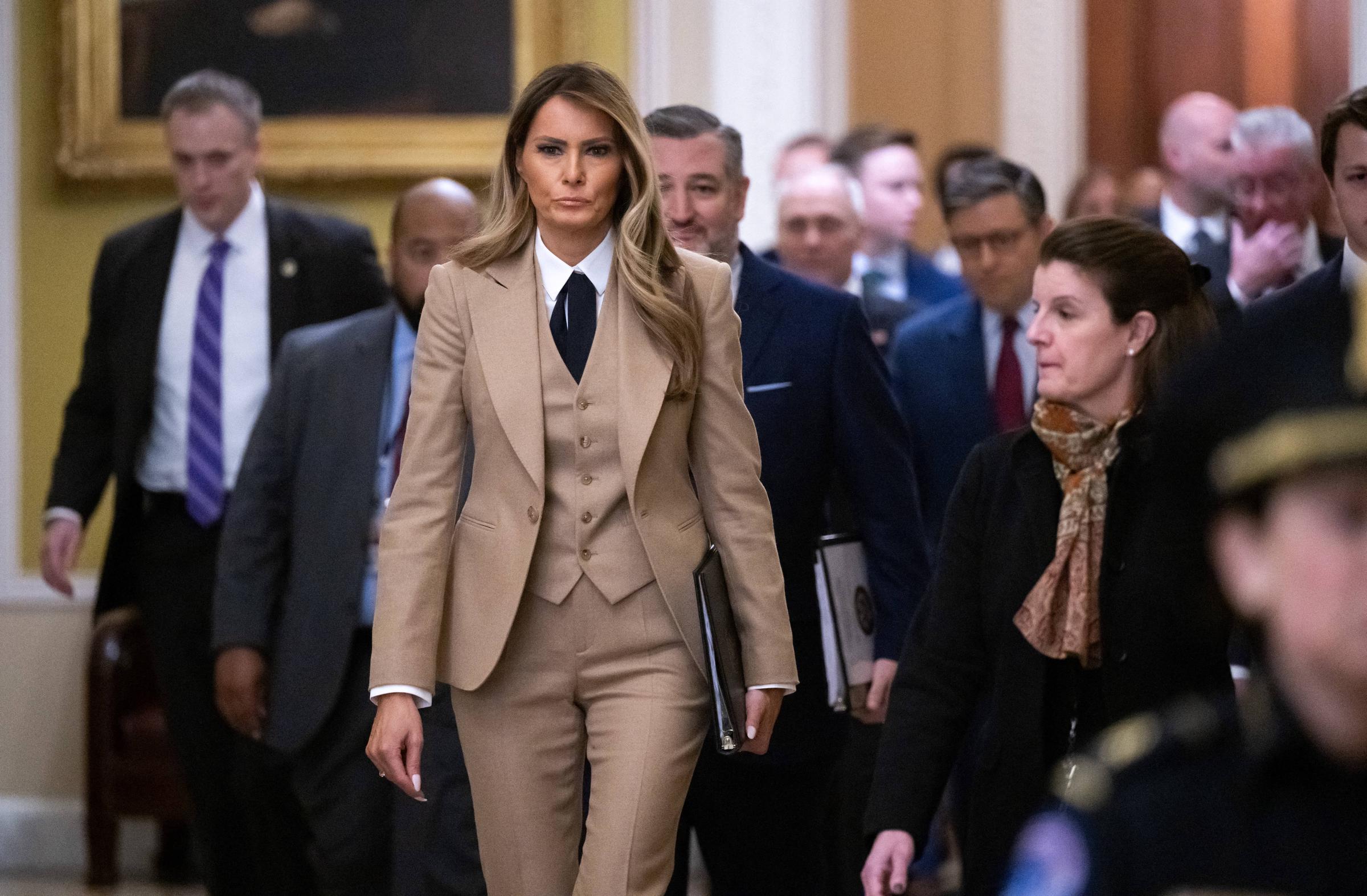 US First Lady Melania Trump walks to a meeting to urge passage of the Take It Down Act by the US Senate which protects victims of real and deepfake "revenge pornography" by criminalizing their publication, at the US Capitol in Washington, DC, on March 3, 2025 | Source: Getty Images