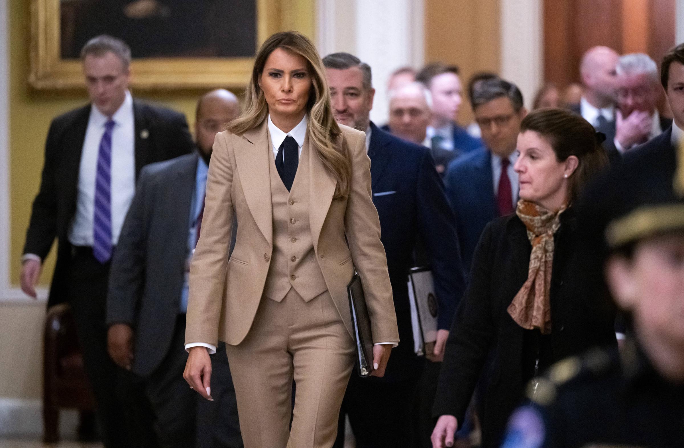 Melania Trump Makes A Rare Solo Appearance In 3 Piece Tan Suit 